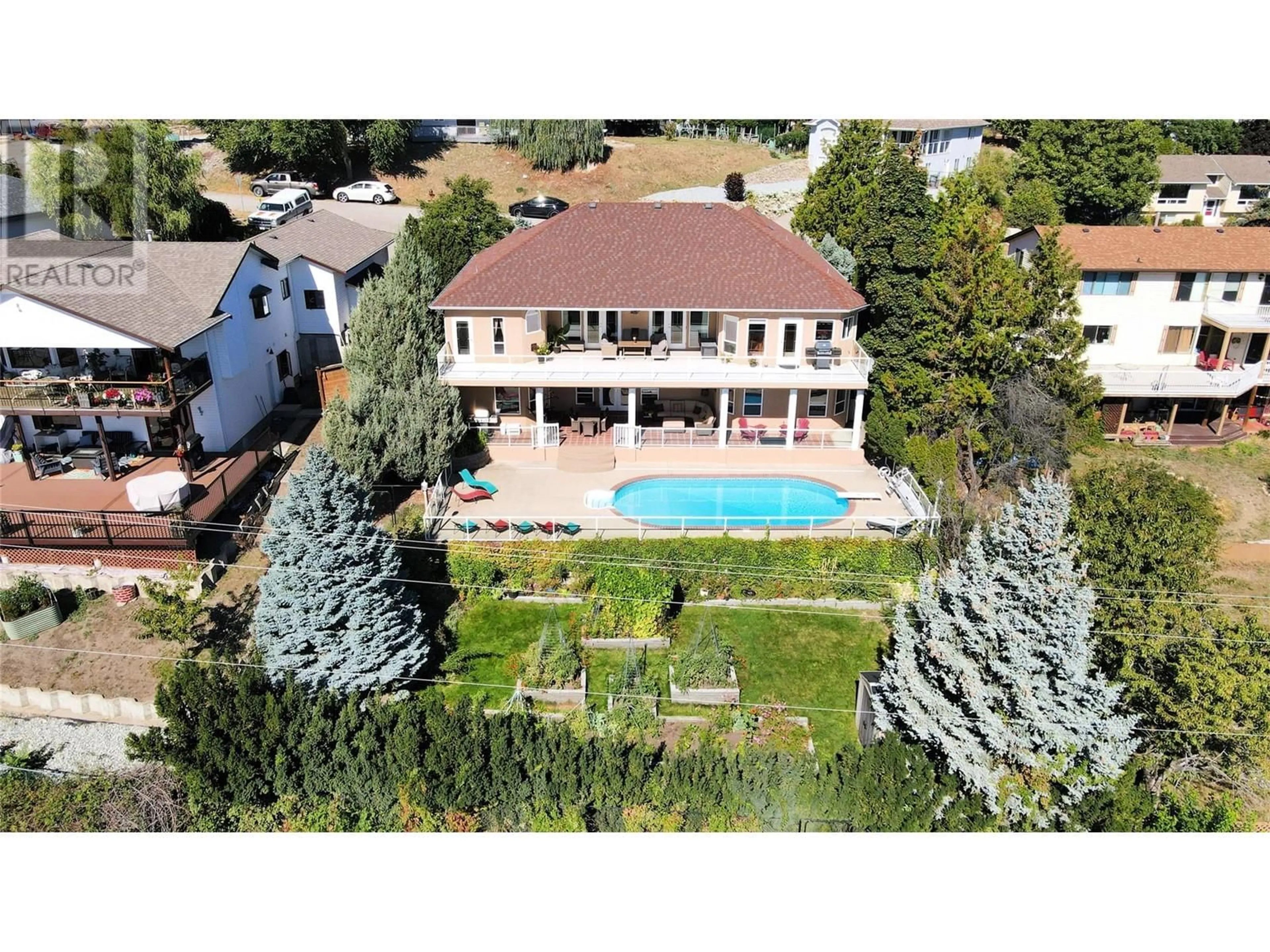 A pic from outside/outdoor area/front of a property/back of a property/a pic from drone, unknown for 6097 Beatrice Road, Peachland British Columbia V0H1X4