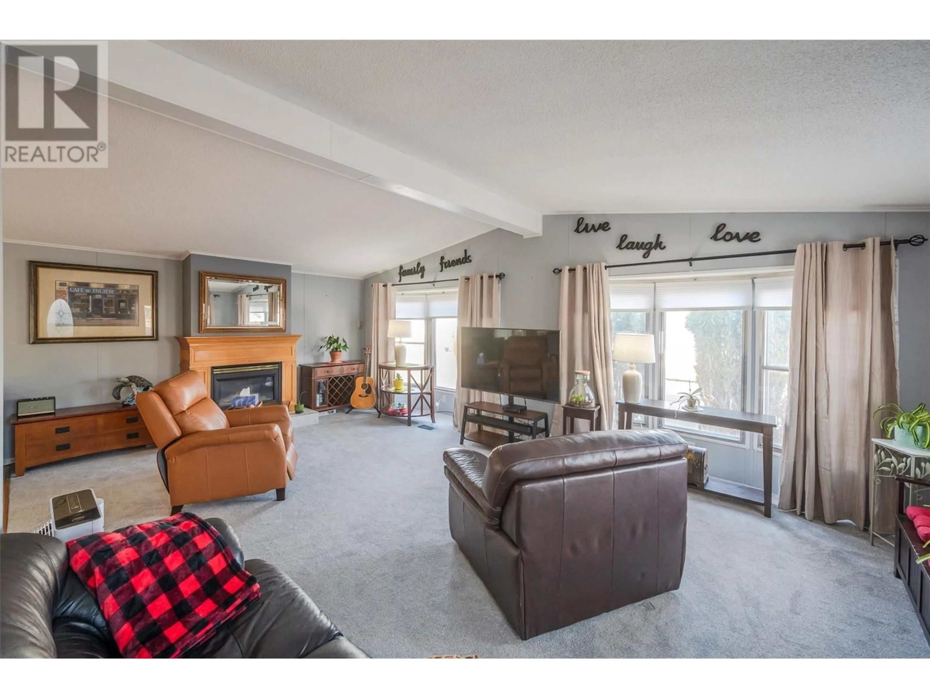 Living room with furniture, unknown for 302 - 197 DAUPHIN AVENUE, Penticton British Columbia V2A3S3