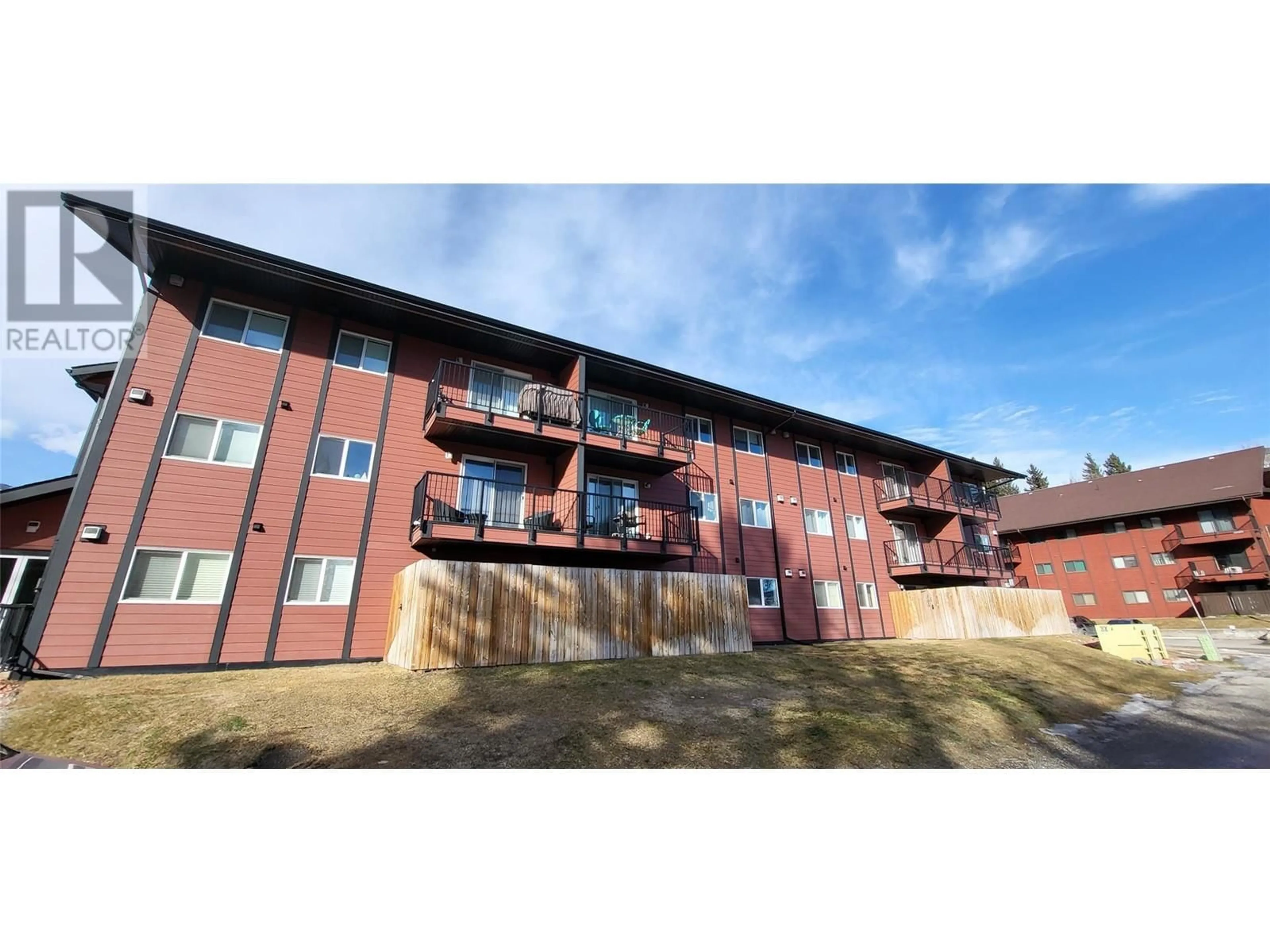 A pic from outside/outdoor area/front of a property/back of a property/a pic from drone, building for 1286 PONDEROSA Drive Unit# 203, Sparwood British Columbia V0B2G2