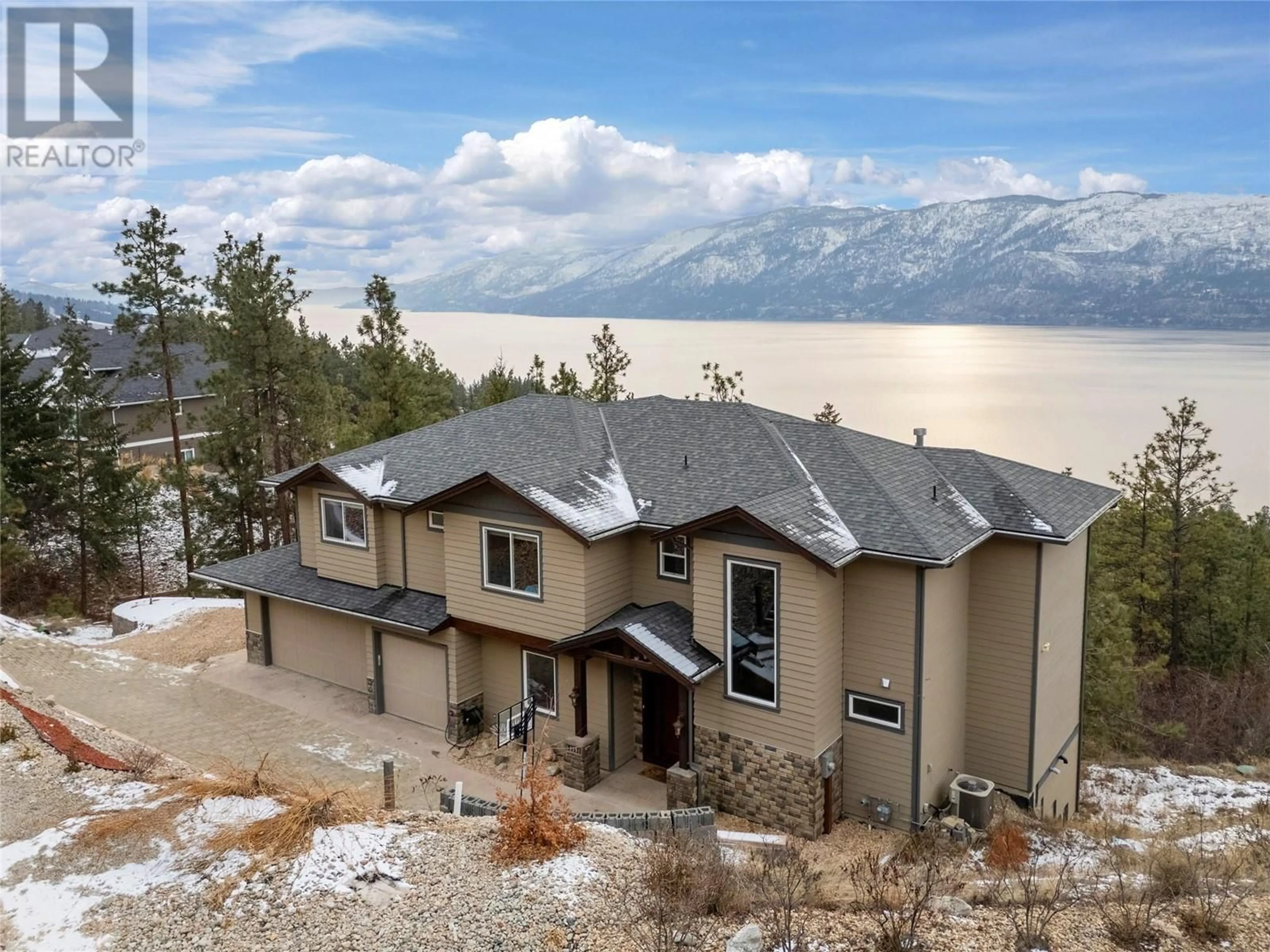 A pic from outside/outdoor area/front of a property/back of a property/a pic from drone, water/lake/river/ocean view for 13598 Townsend Drive, Lake Country British Columbia V4V2S8