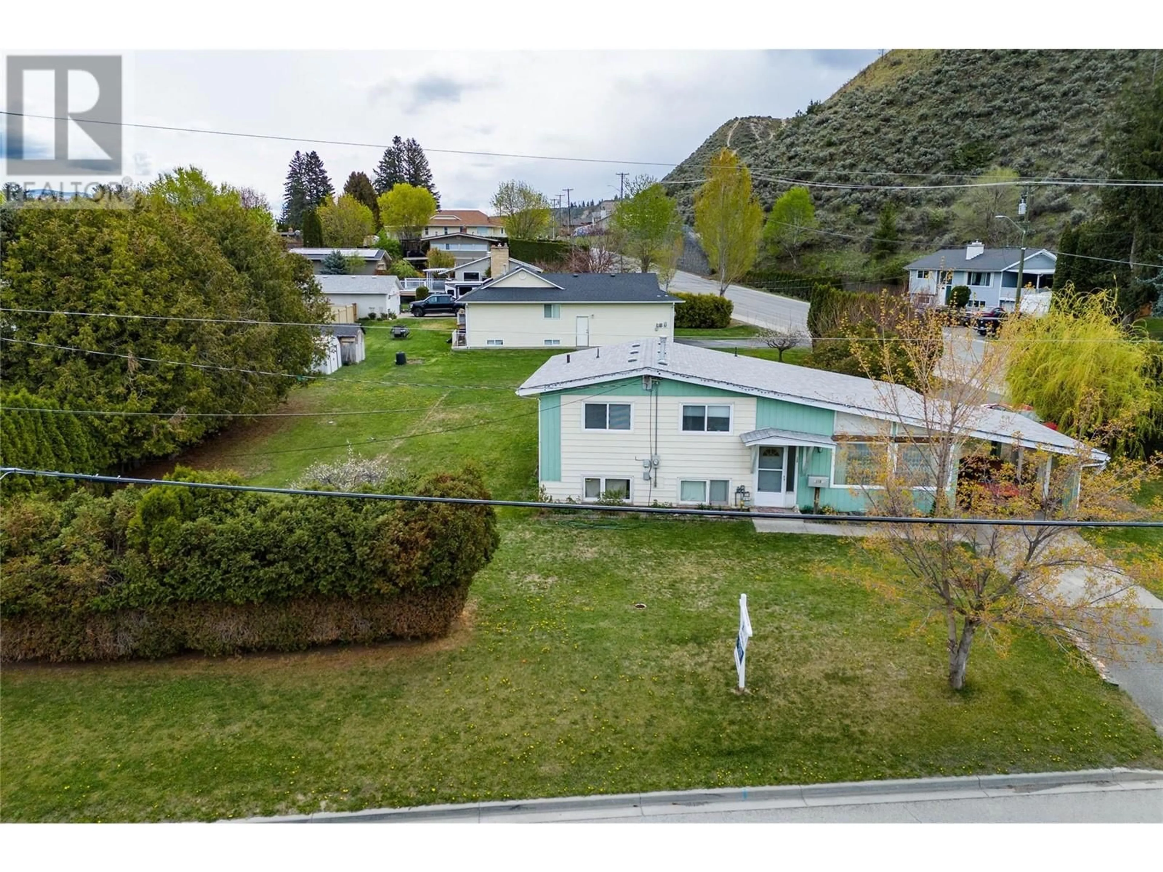 A pic from outside/outdoor area/front of a property/back of a property/a pic from drone, mountain view for 159 TANAGER Drive, Kamloops British Columbia V2H1T7