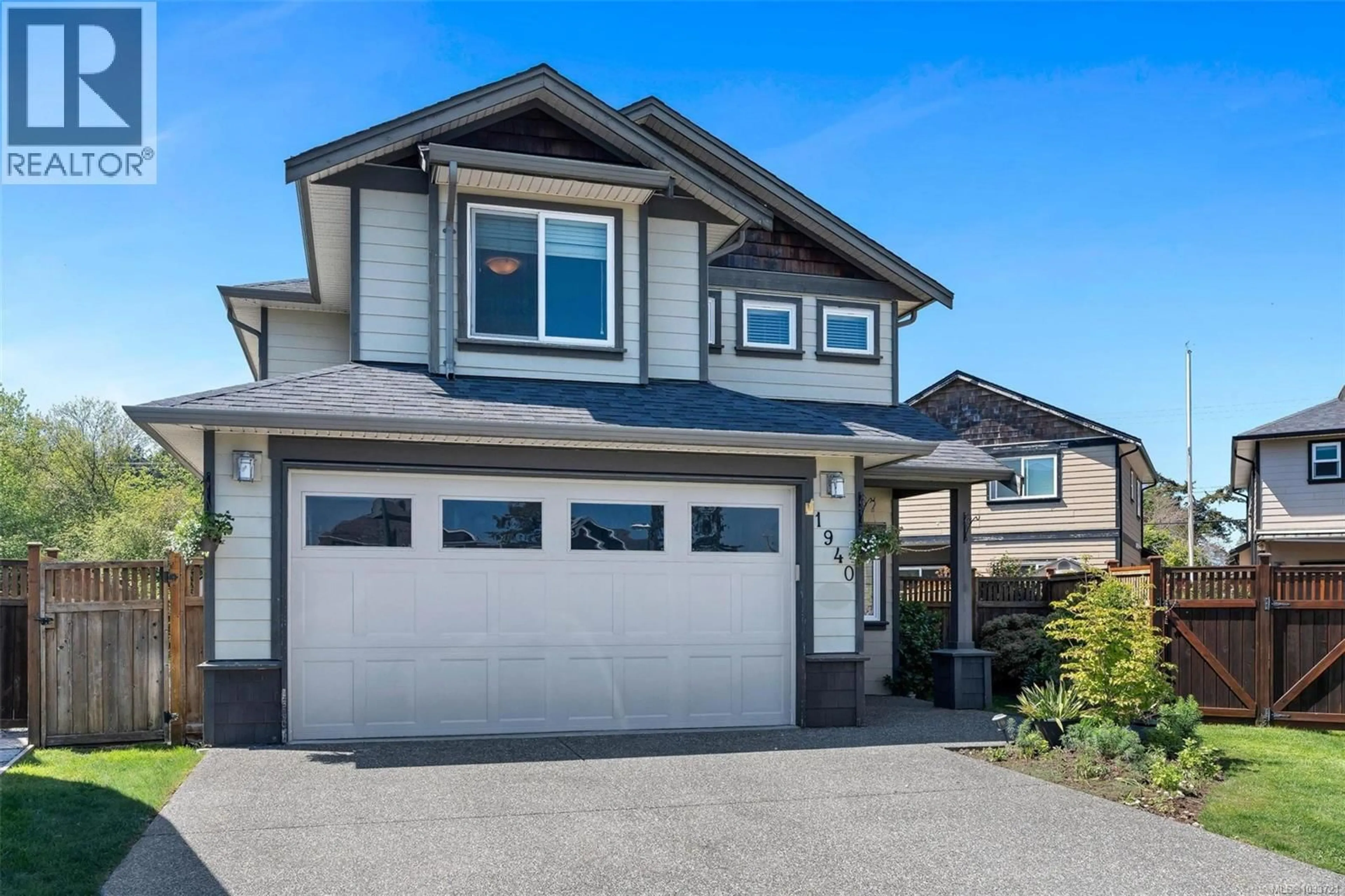 Home with vinyl exterior material, street for 1940 BRACKMAN WAY, North Saanich British Columbia V8L0C2