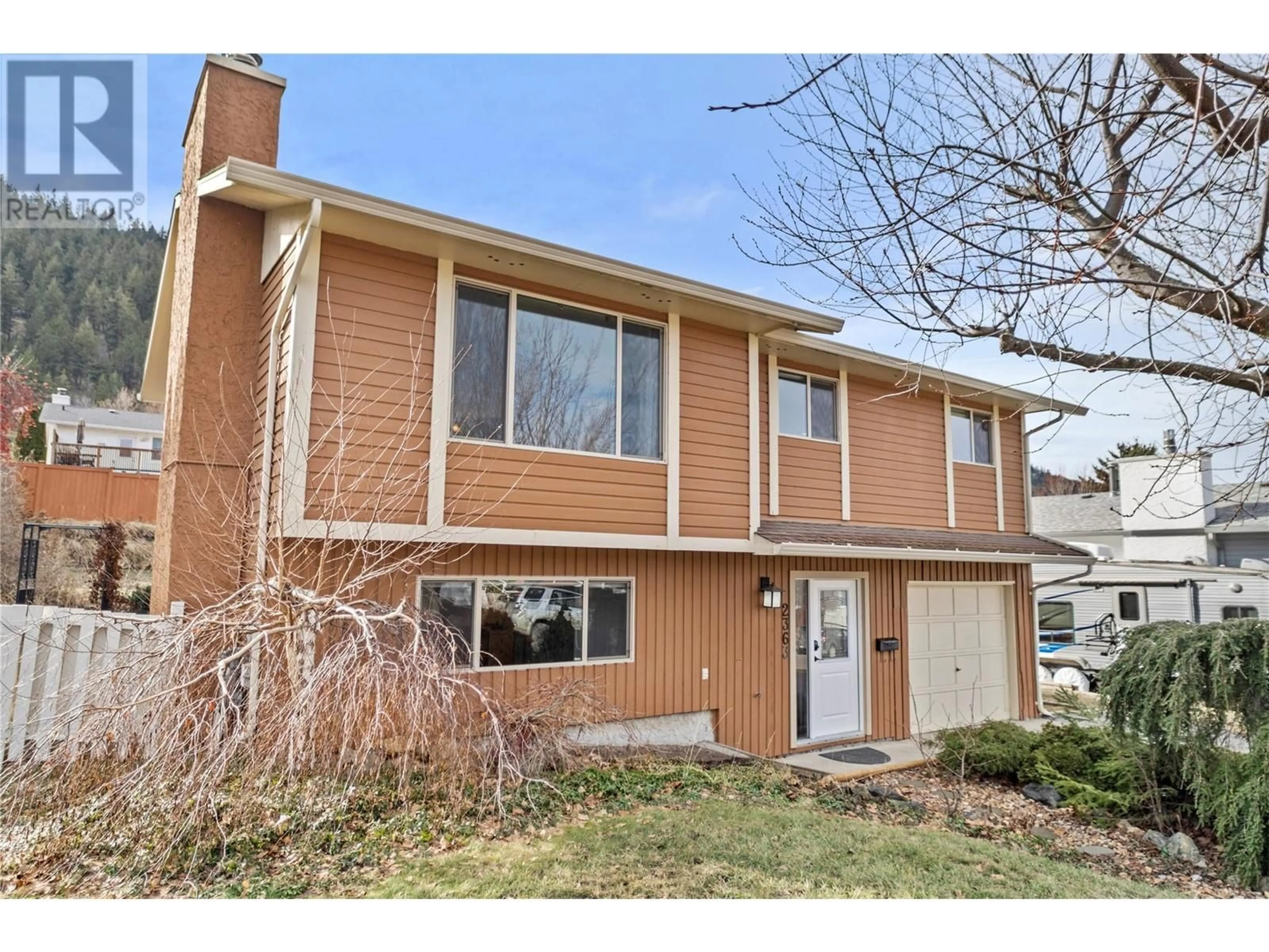 Home with vinyl exterior material, street for 2363 NECHAKO Drive, Kamloops British Columbia V2E1T8