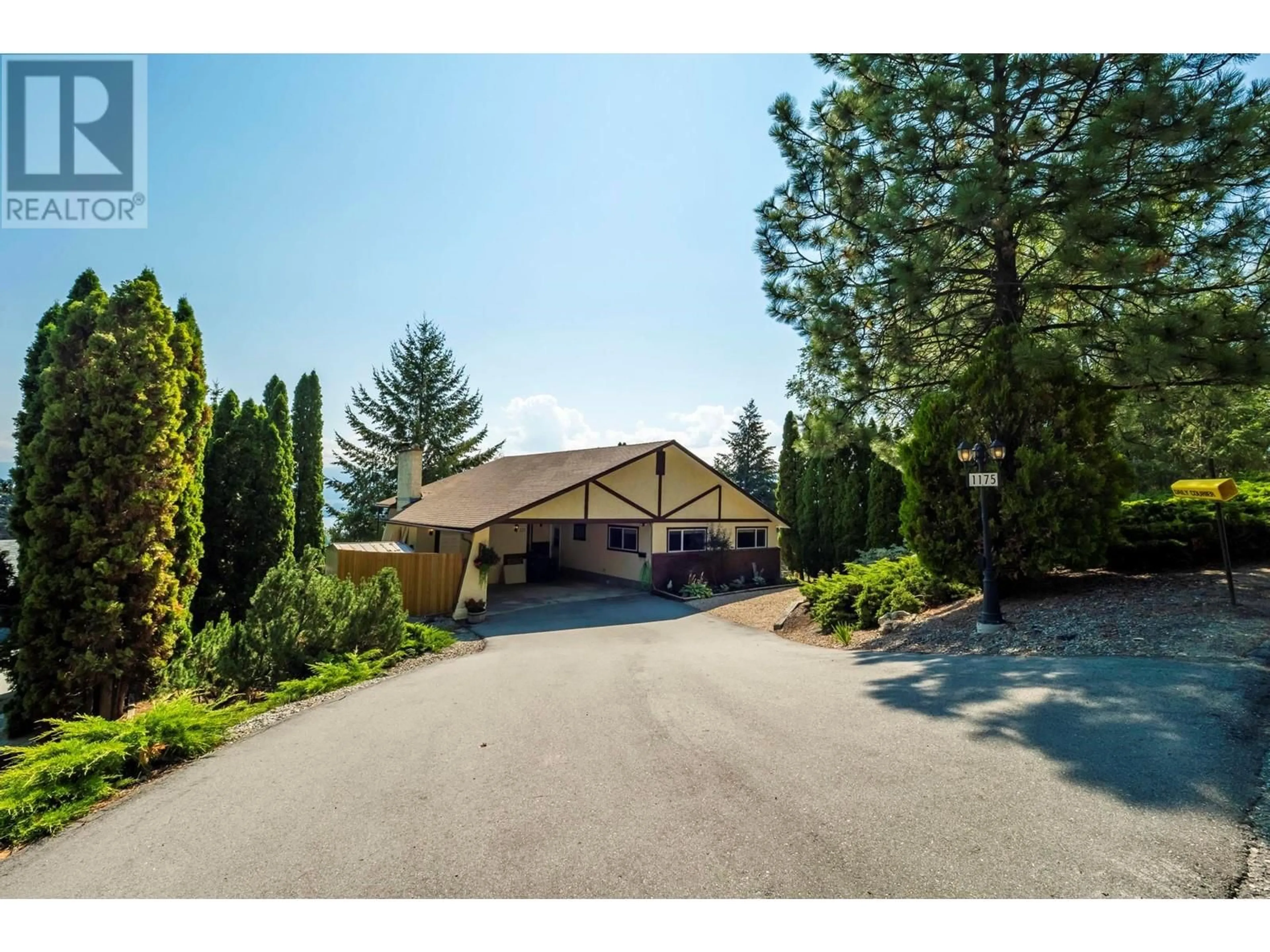 A pic from outside/outdoor area/front of a property/back of a property/a pic from drone, mountain view for 1175 Trevor Drive, West Kelowna British Columbia V1Z2K1