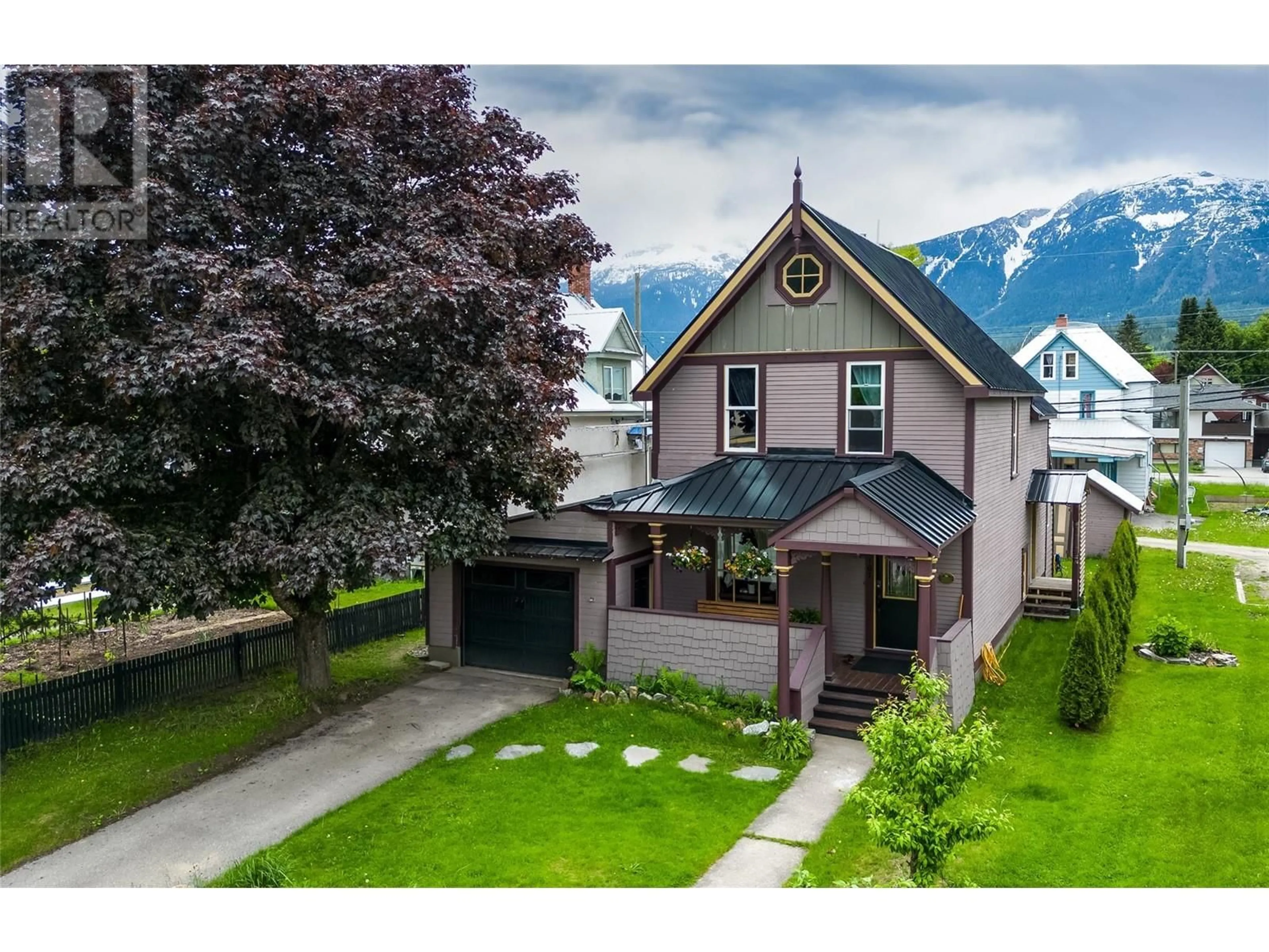 A pic from outside/outdoor area/front of a property/back of a property/a pic from drone, street for 107 Third Street E, Revelstoke British Columbia V0E2S0