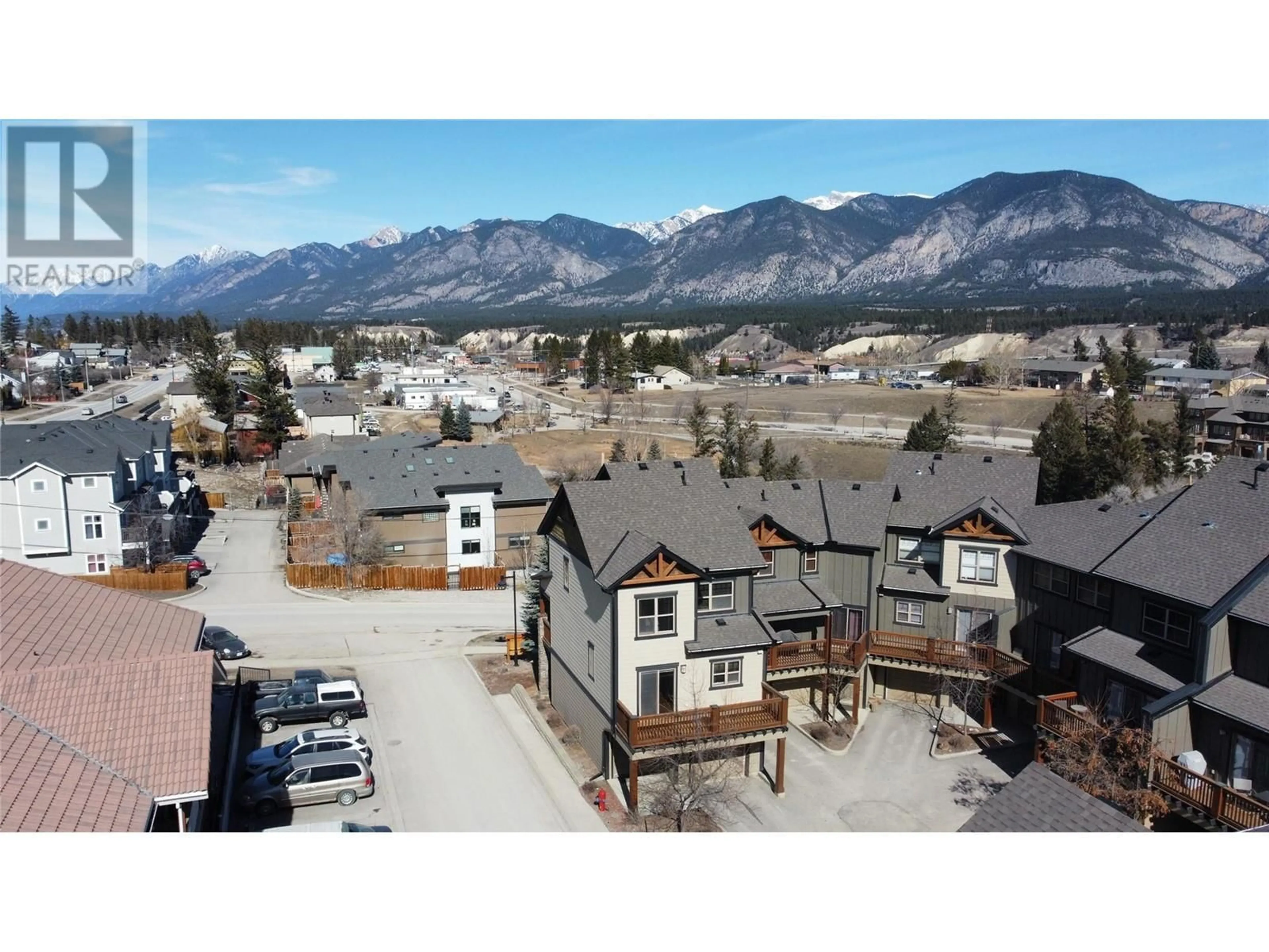 A pic from outside/outdoor area/front of a property/back of a property/a pic from drone, mountain view for 1000 9TH Street Unit# 1, Invermere British Columbia V0A1K0