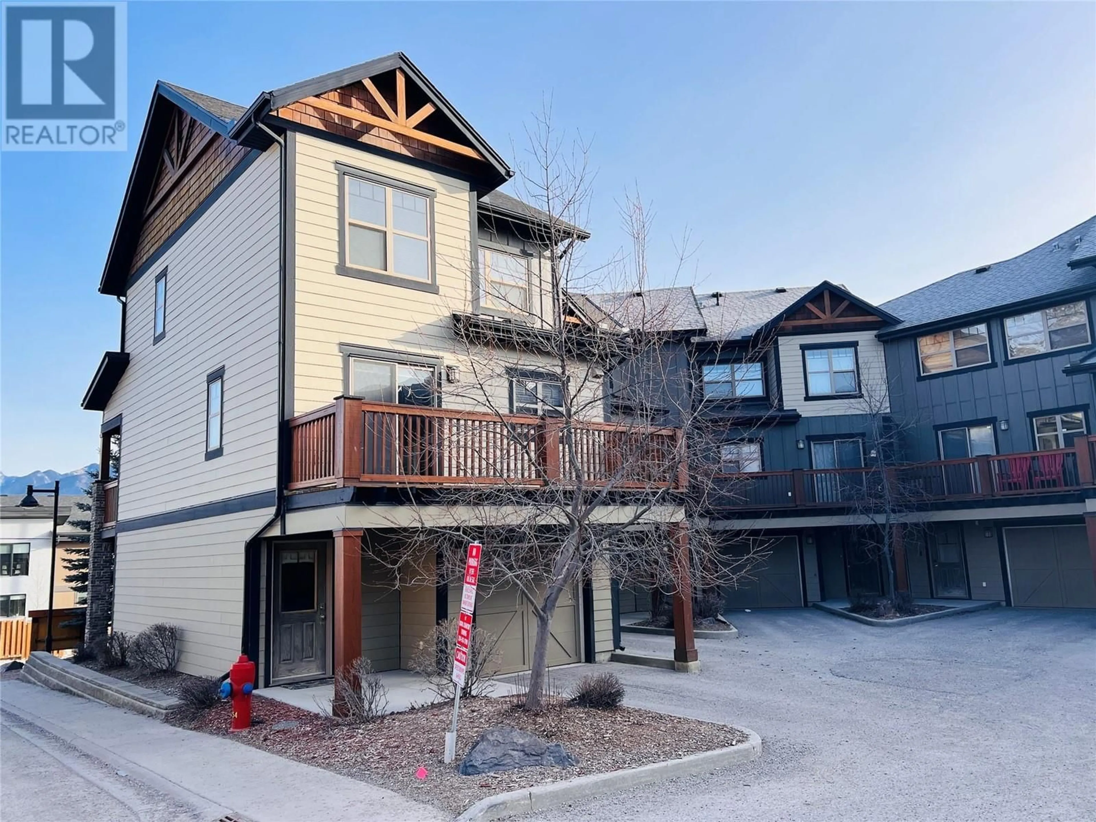 A pic from outside/outdoor area/front of a property/back of a property/a pic from drone, street for 1000 9TH Street Unit# 1, Invermere British Columbia V0A1K0