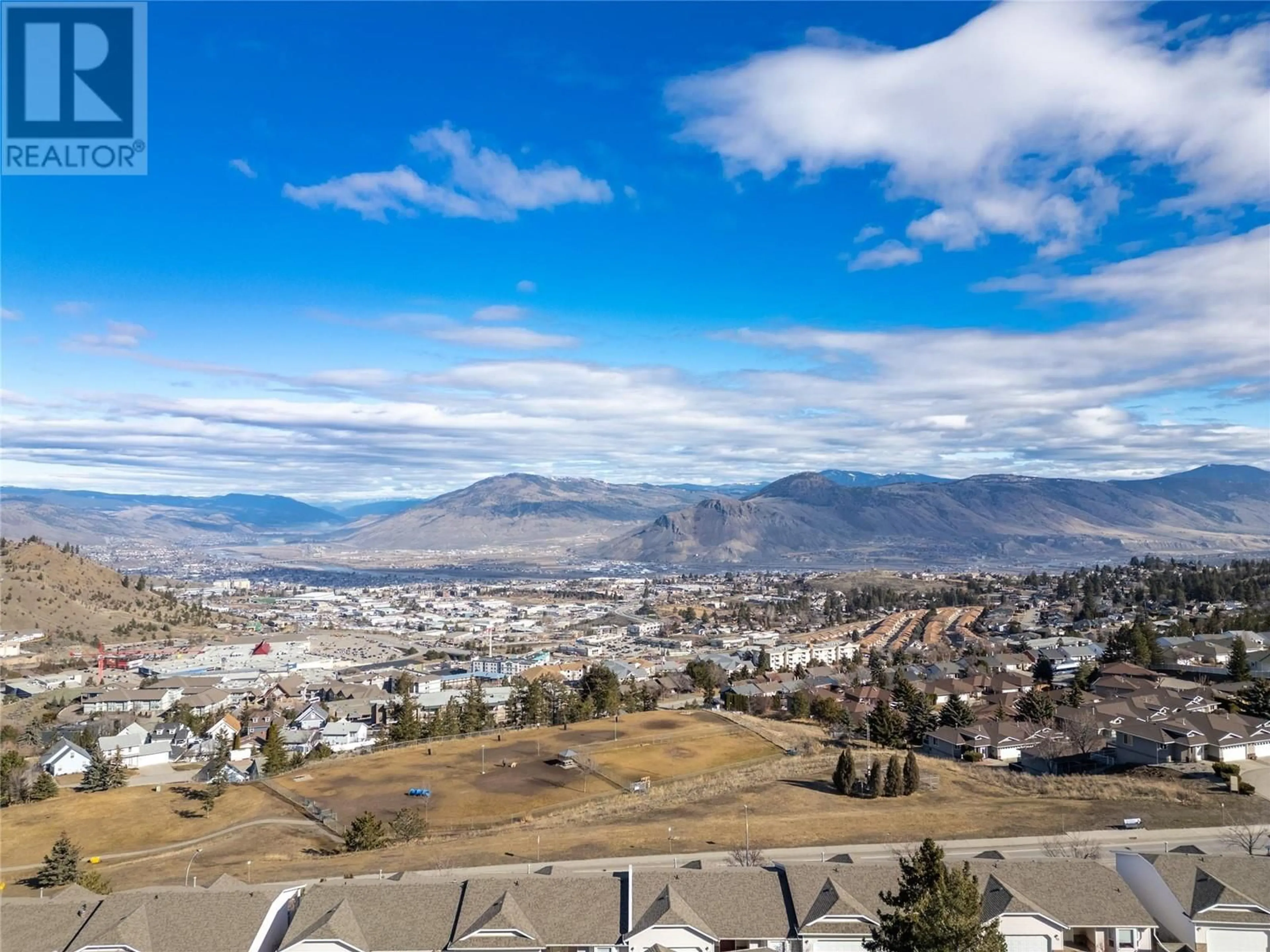 A pic from outside/outdoor area/front of a property/back of a property/a pic from drone, mountain view for 63 - 2022 PACIFIC WAY, Kamloops British Columbia V1S1T1