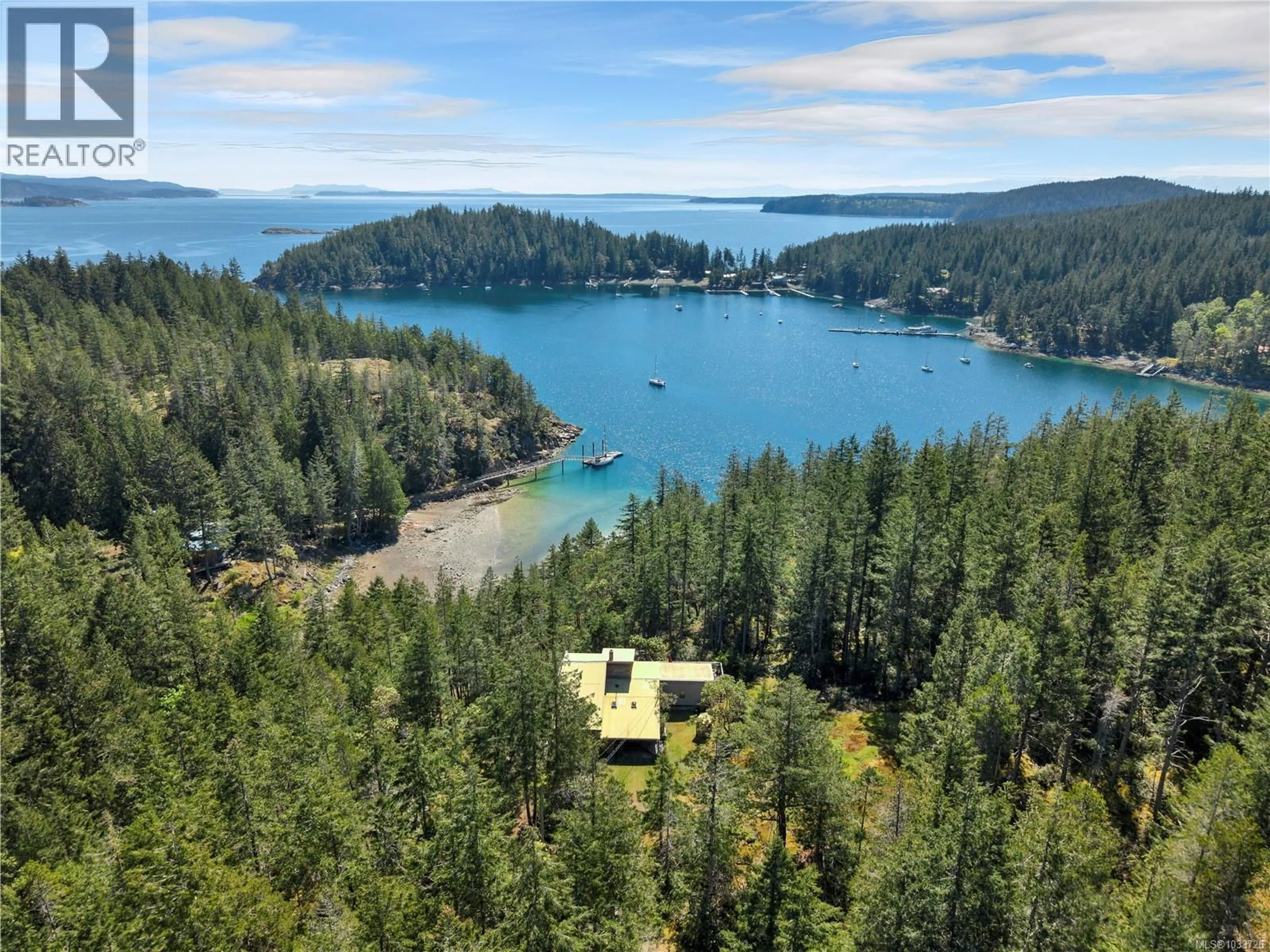 A pic from outside/outdoor area/front of a property/back of a property/a pic from drone, water/lake/river/ocean view for 1395 MANZANITA ROAD, Cortes Island British Columbia V0P1K0