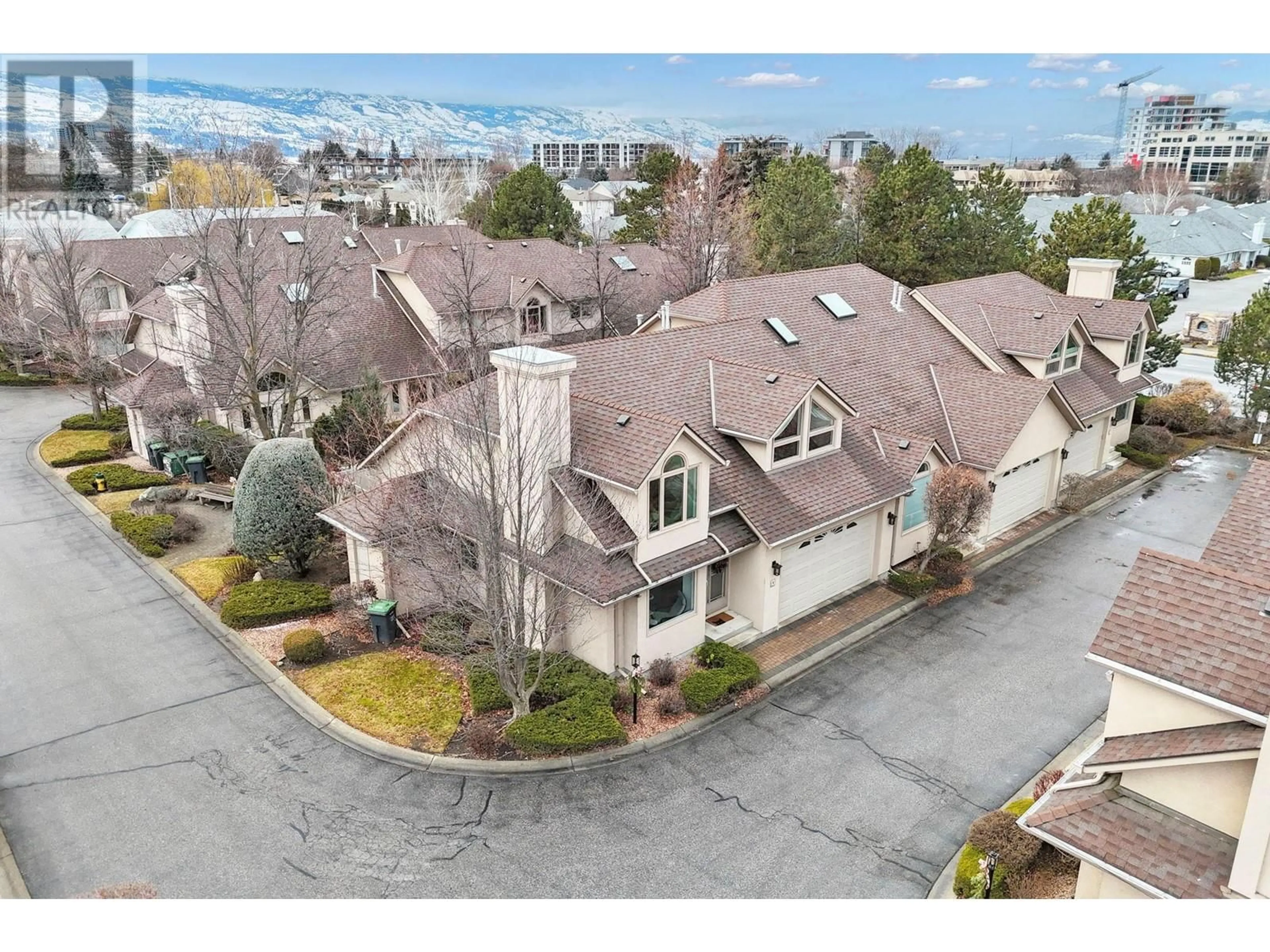 A pic from outside/outdoor area/front of a property/back of a property/a pic from drone, mountain view for 3389 Casorso Road Unit# 13, Kelowna British Columbia V1W3J5