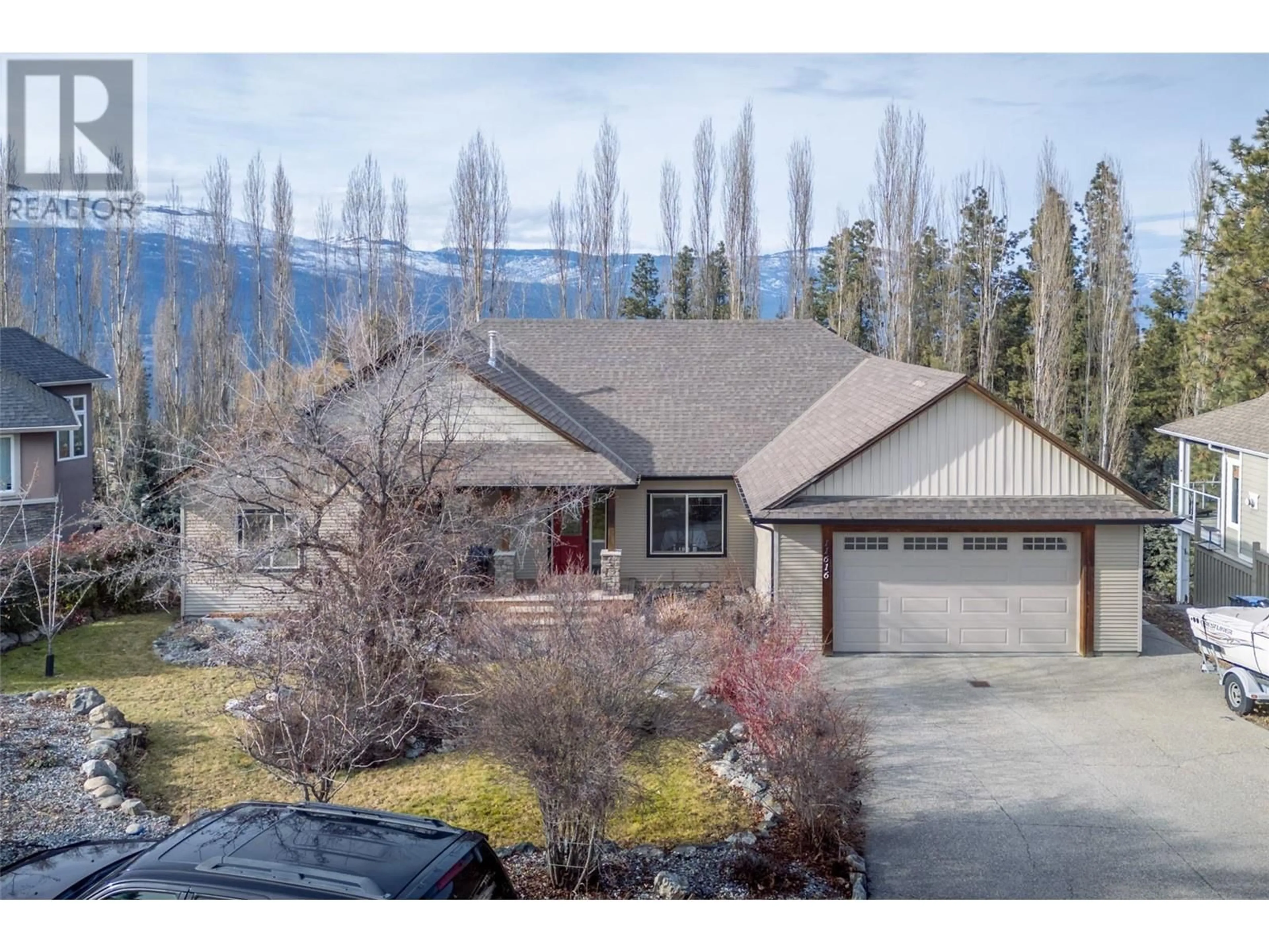 A pic from outside/outdoor area/front of a property/back of a property/a pic from drone, mountain view for 11616 Jackson Court, Lake Country British Columbia V4V2M6