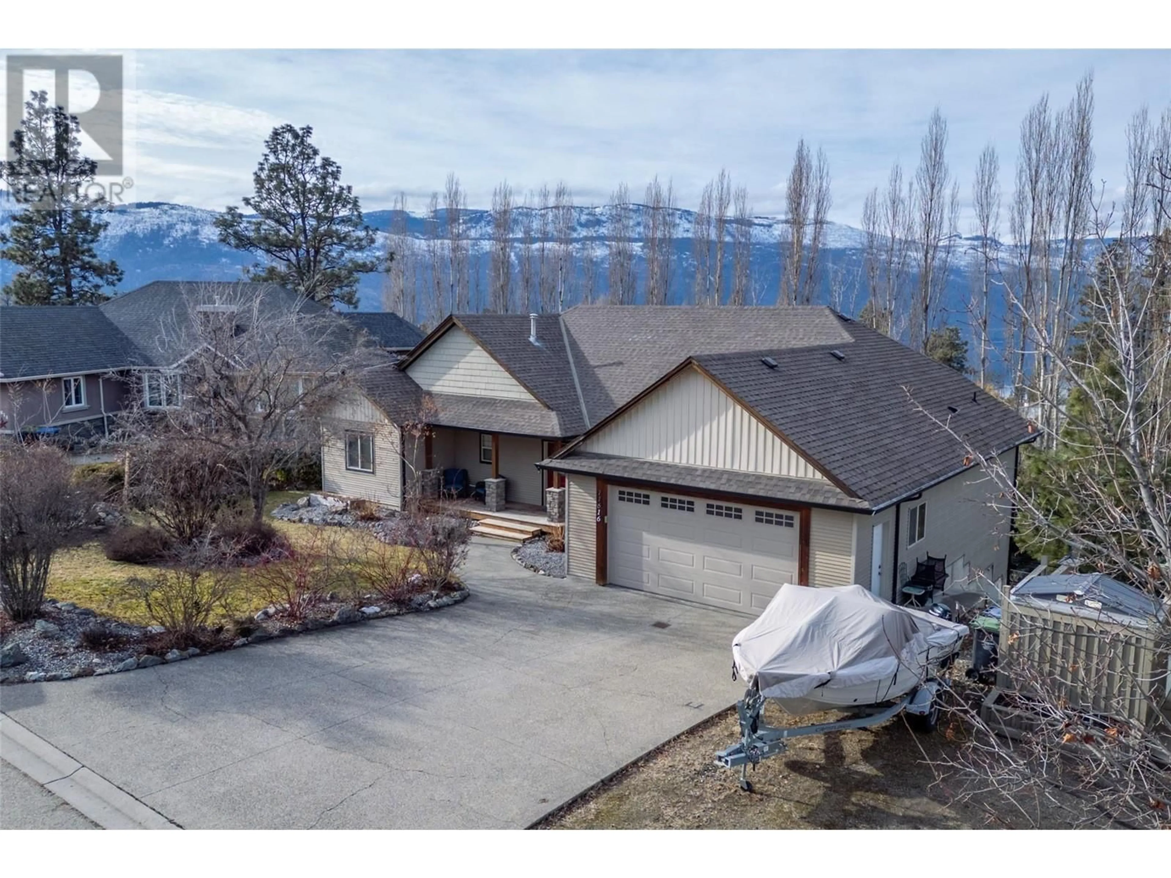 A pic from outside/outdoor area/front of a property/back of a property/a pic from drone, mountain view for 11616 Jackson Court, Lake Country British Columbia V4V2M6