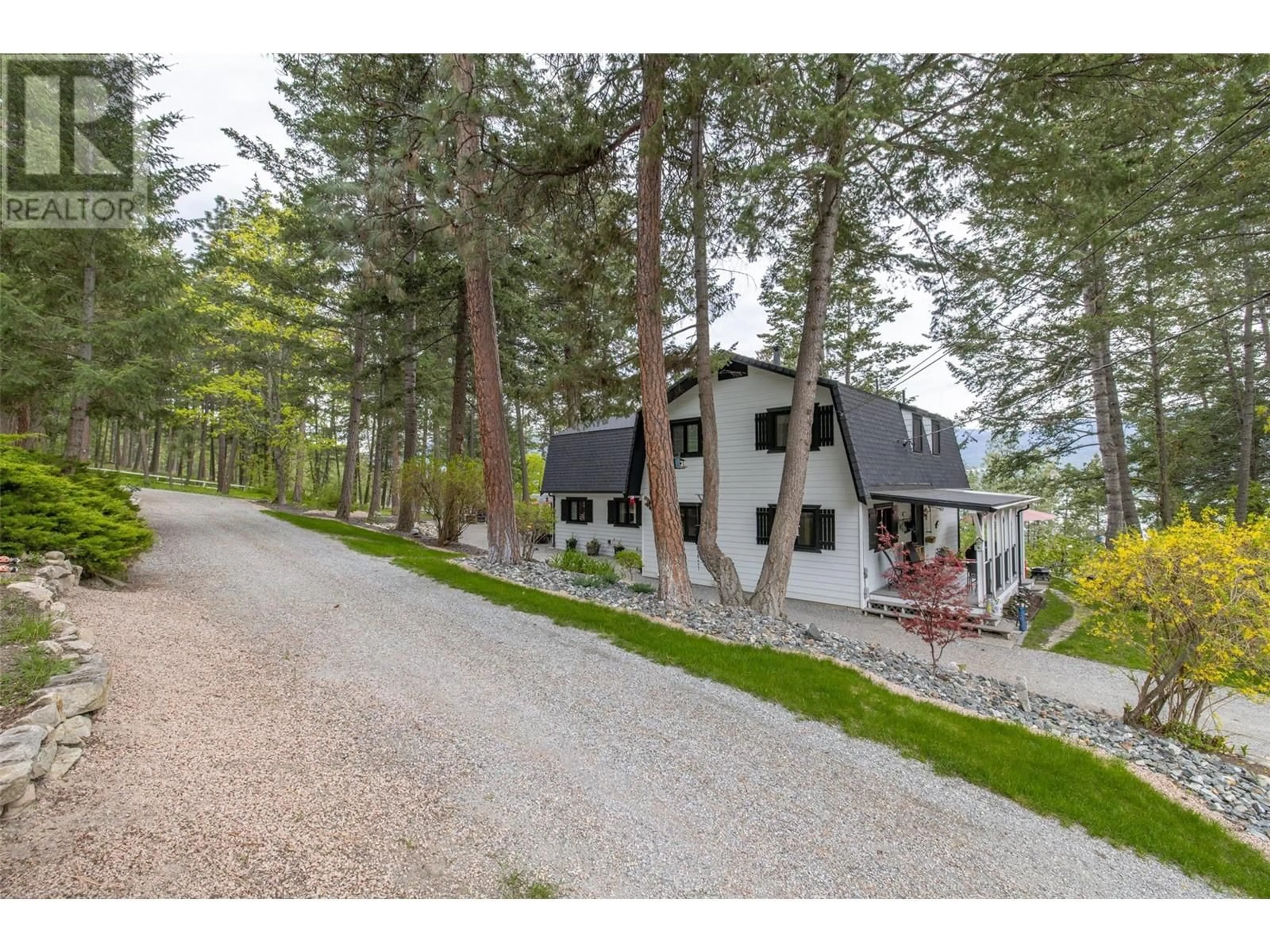 A pic from outside/outdoor area/front of a property/back of a property/a pic from drone, forest/trees view for 16550 BARKLEY ROAD, Lake Country British Columbia V4V1B5