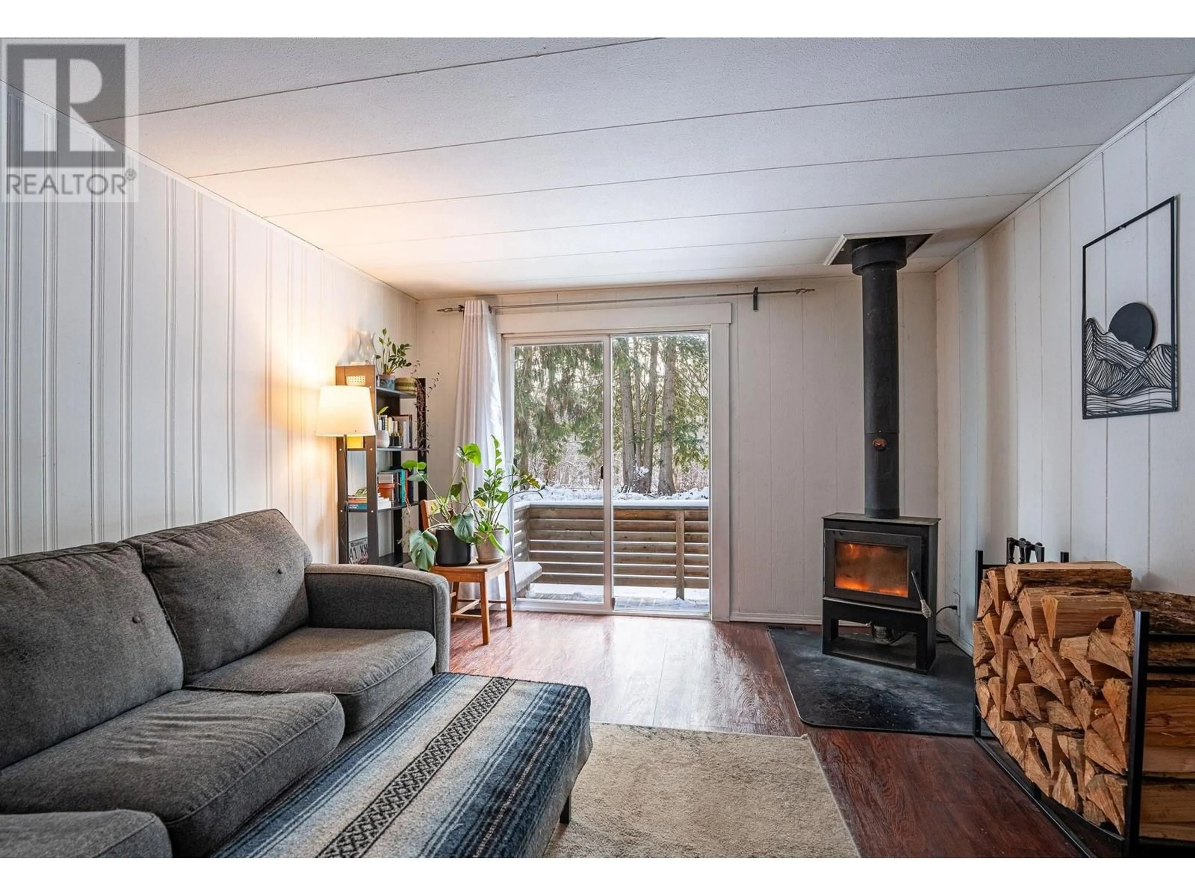 Living room with furniture, wood/laminate floor for 1079 Lundell Road Unit# 3, Revelstoke British Columbia V0E2S0