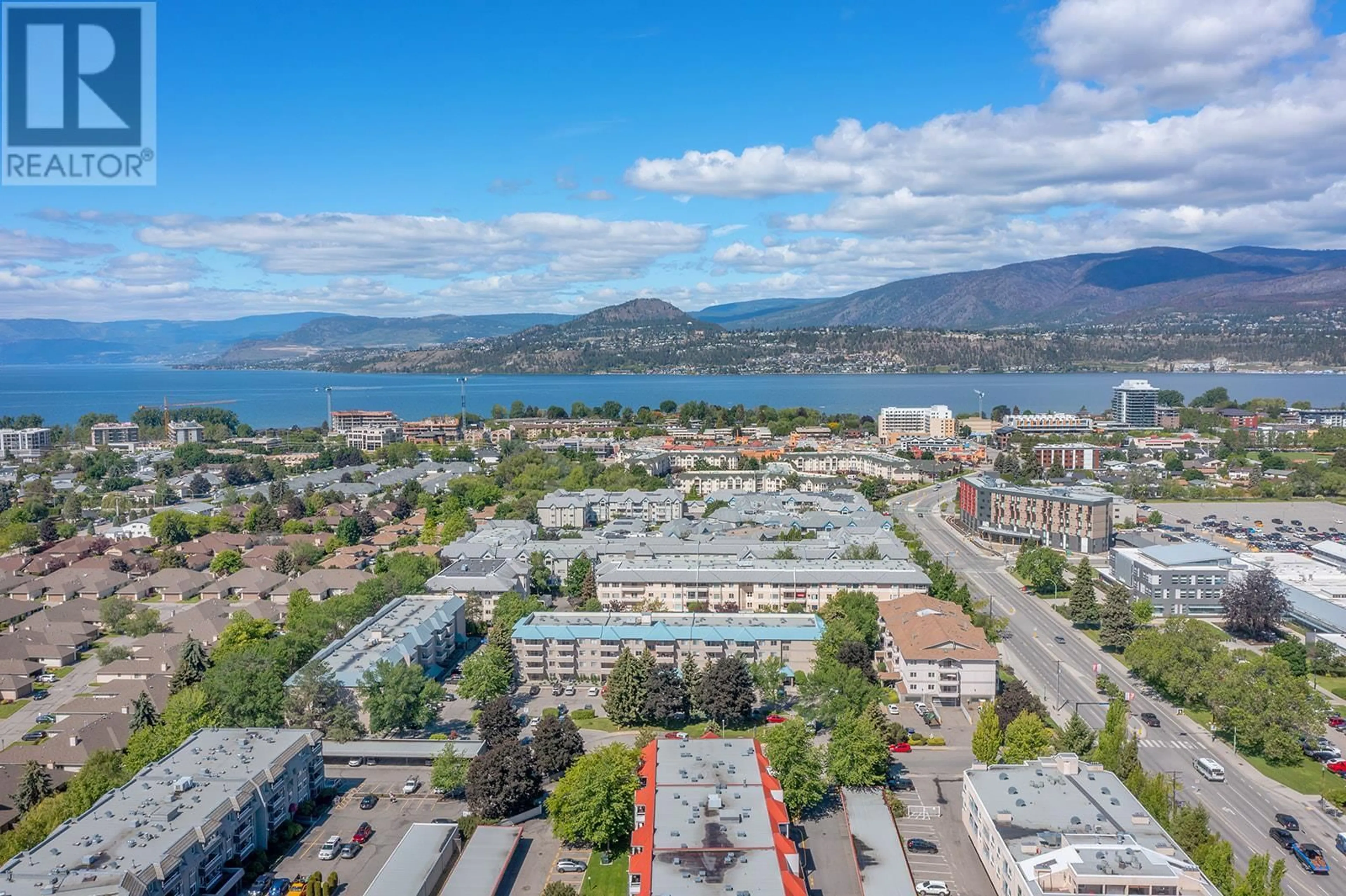 A pic from outside/outdoor area/front of a property/back of a property/a pic from drone, water/lake/river/ocean view for 3160 De Montreuil Court Unit# 208, Kelowna British Columbia V1W3W3