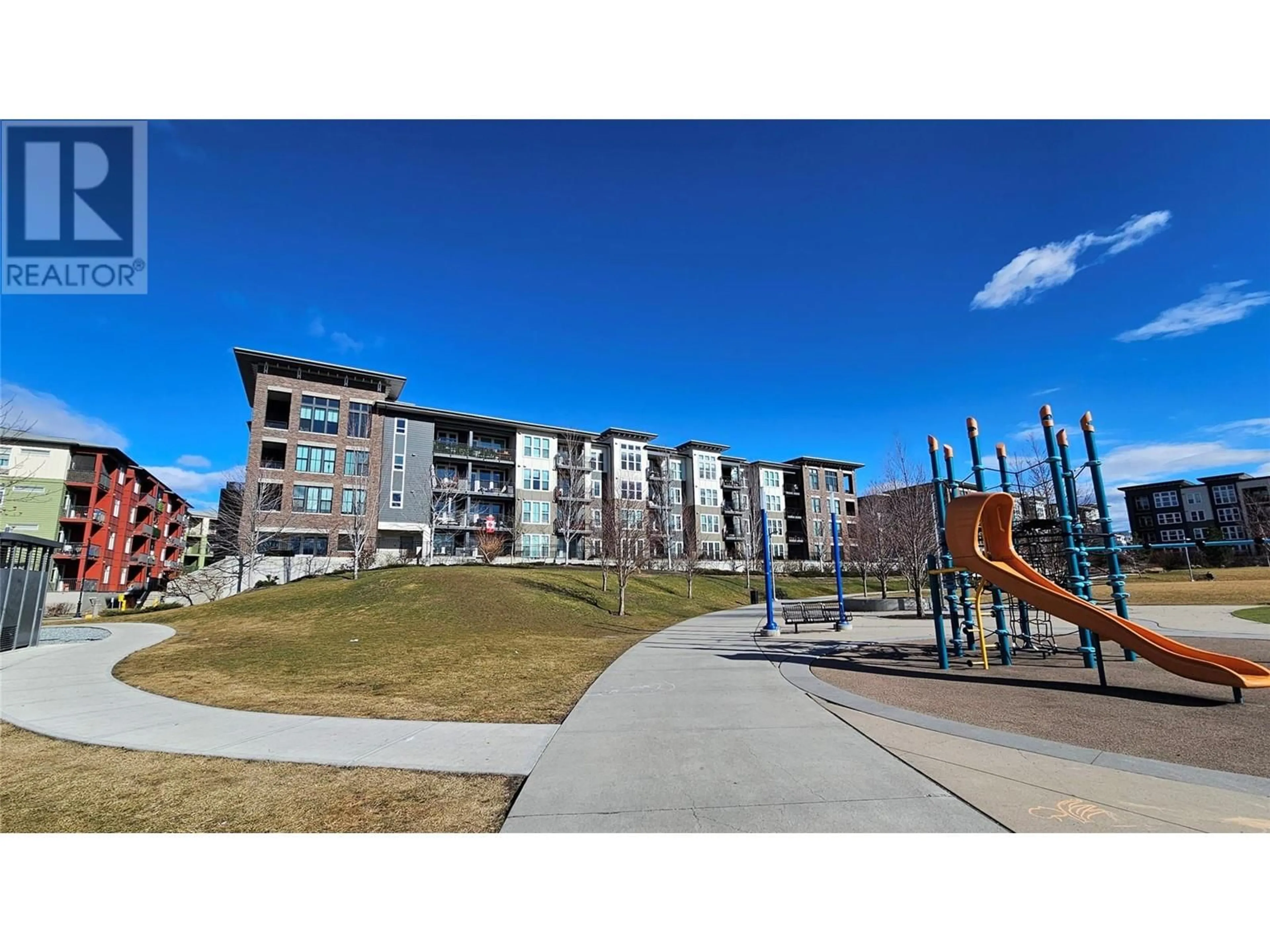 A pic from outside/outdoor area/front of a property/back of a property/a pic from drone, unknown for 1775 Chapman Place Unit# 303, Kelowna British Columbia V1Y0G3