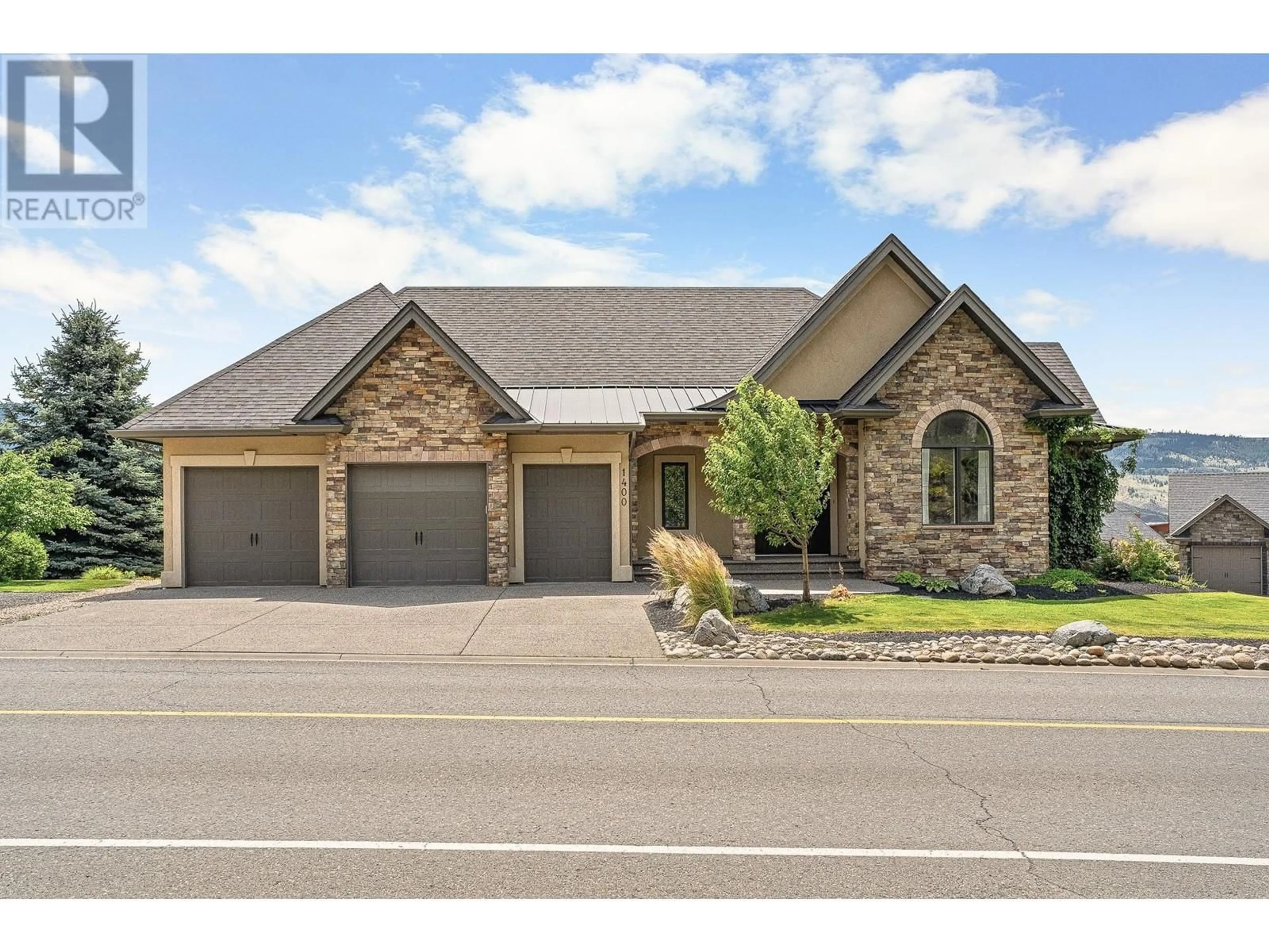 Home with brick exterior material, street for 1400 SUN RIVERS DRIVE, Kamloops British Columbia V2H0A2