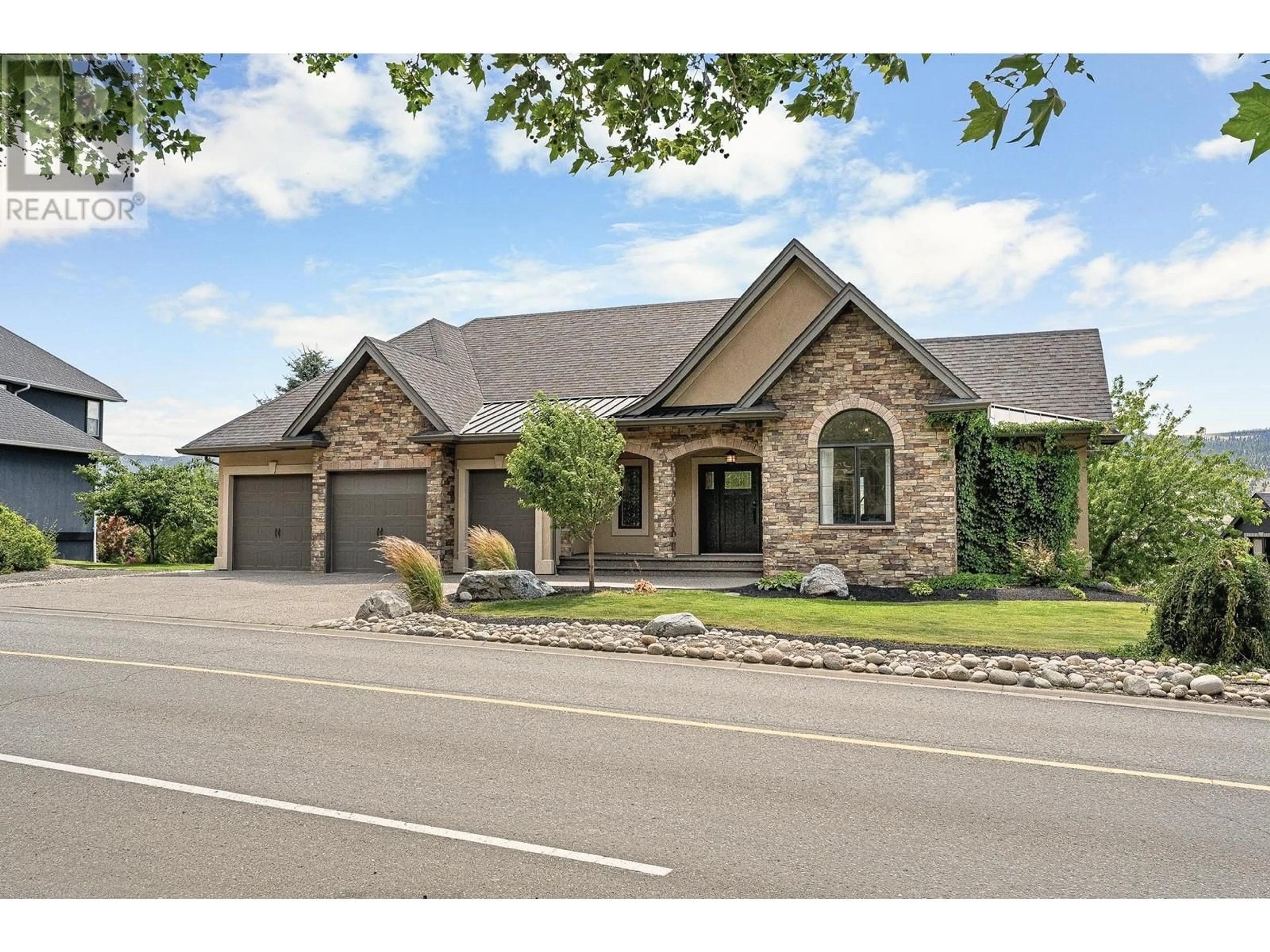 Home with brick exterior material, street for 1400 SUN RIVERS DRIVE, Kamloops British Columbia V2H0A2