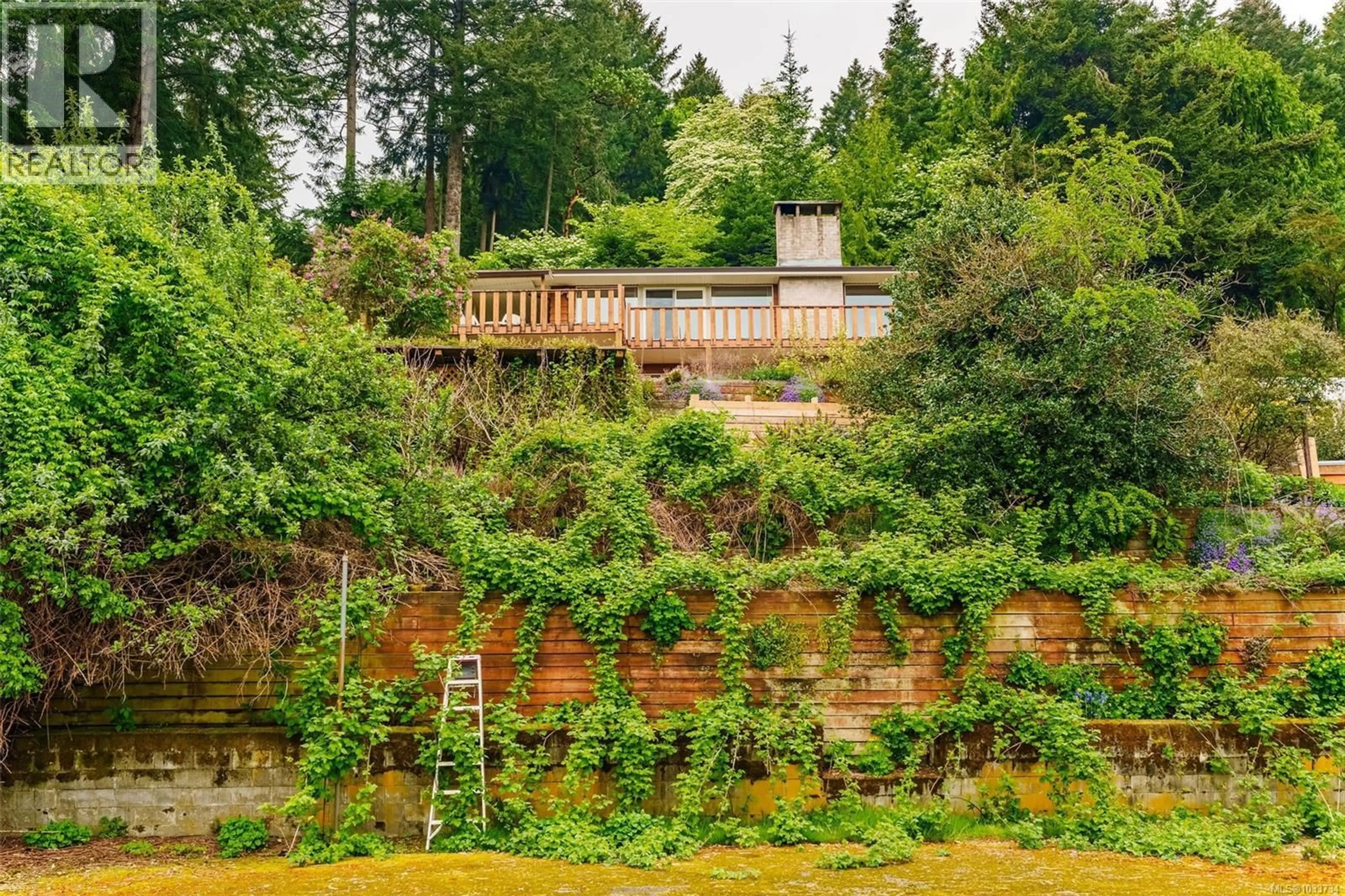 A pic from outside/outdoor area/front of a property/back of a property/a pic from drone, forest/trees view for 1357 LEASK ROAD, Nanaimo British Columbia V9X1P8