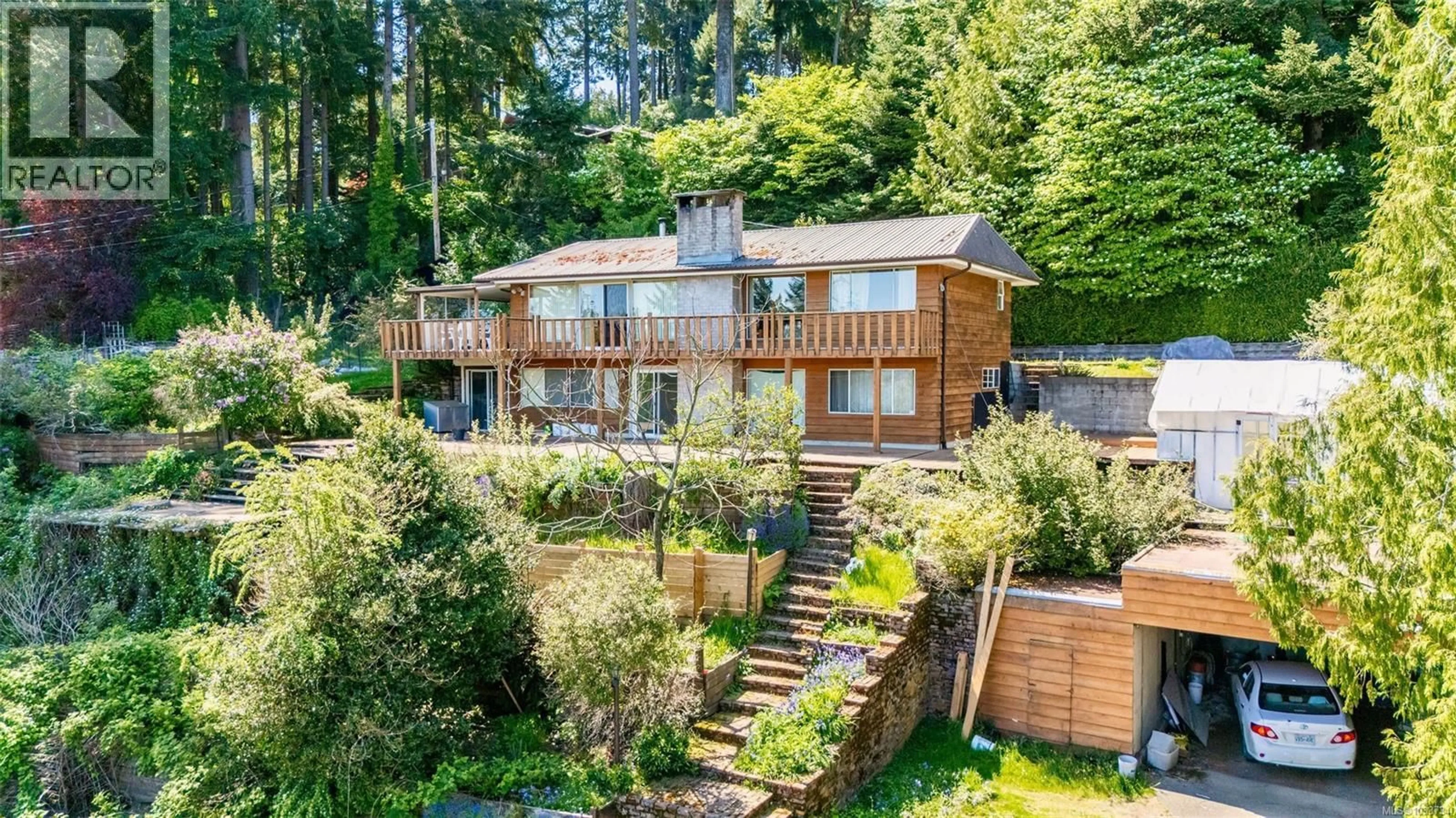 A pic from outside/outdoor area/front of a property/back of a property/a pic from drone, water/lake/river/ocean view for 1357 LEASK ROAD, Nanaimo British Columbia V9X1P8
