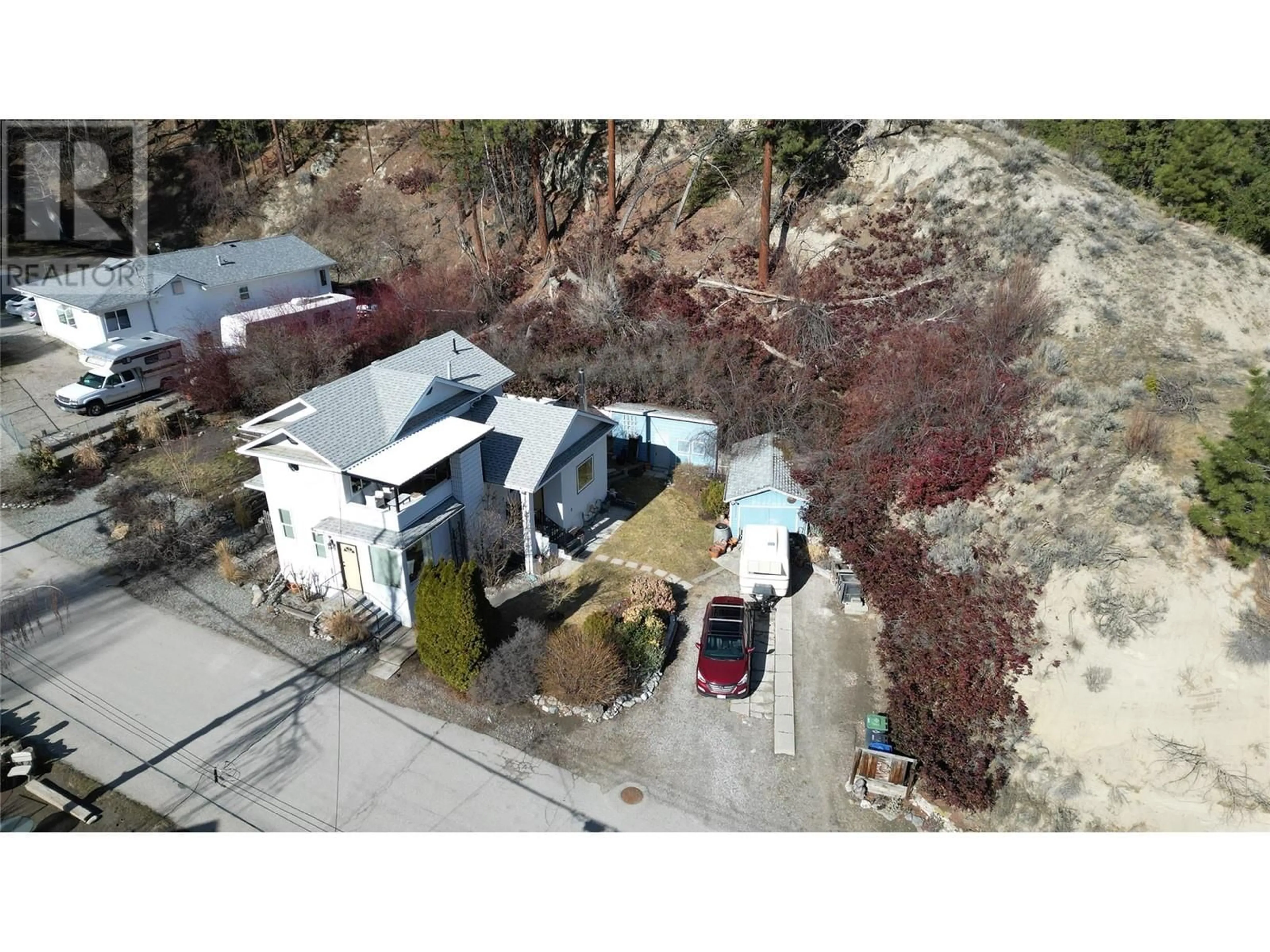 A pic from outside/outdoor area/front of a property/back of a property/a pic from drone, street for 5706 BUTLER STREET, Summerland British Columbia V0H1Z1