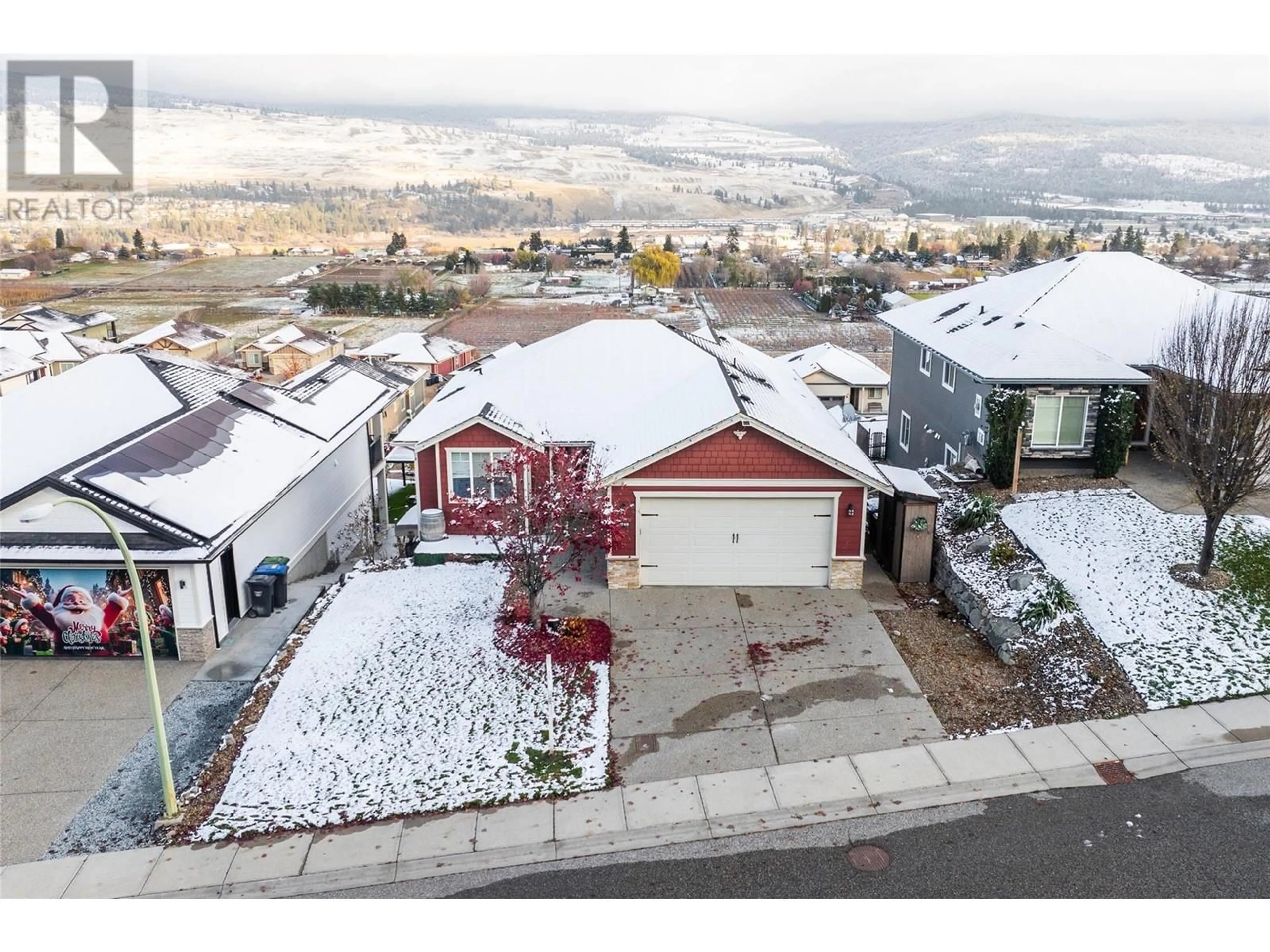 A pic from outside/outdoor area/front of a property/back of a property/a pic from drone, mountain view for 9749 Santina Road, Lake Country British Columbia V4V2R9