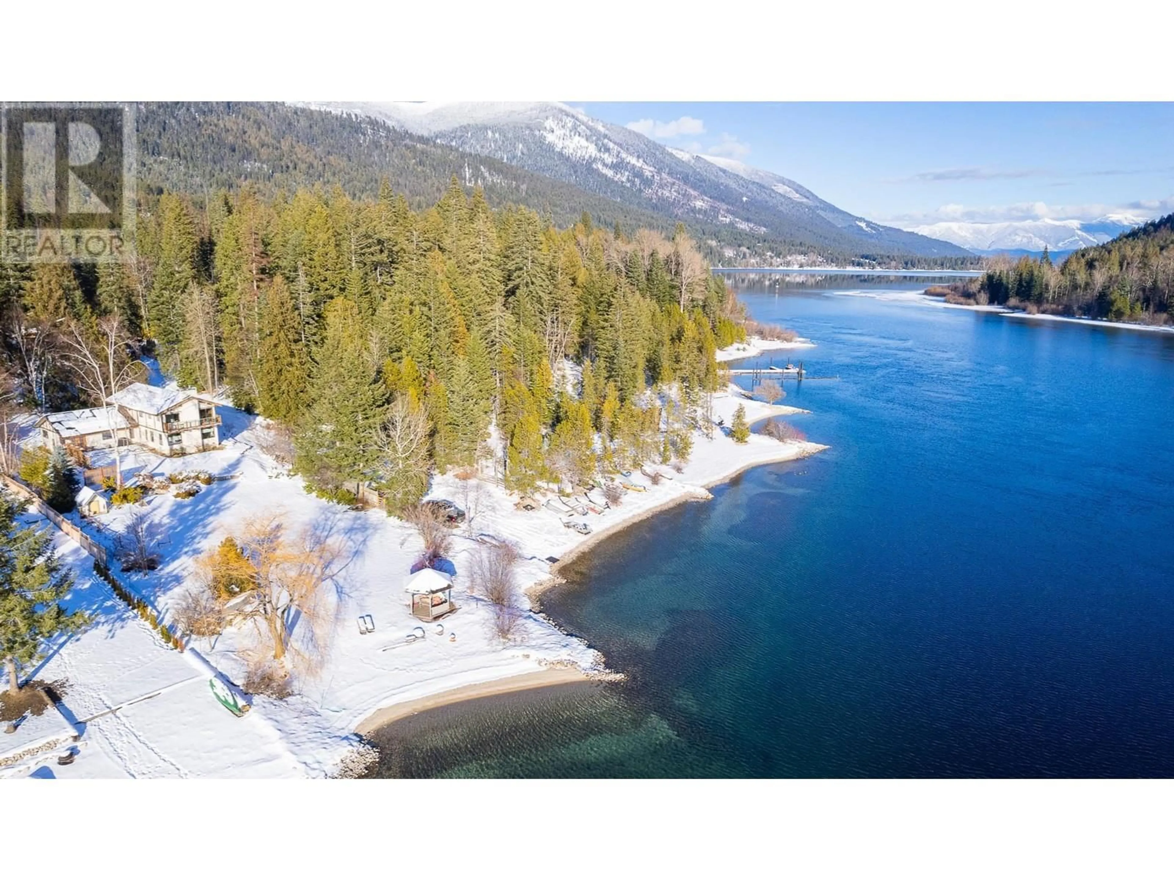 A pic from outside/outdoor area/front of a property/back of a property/a pic from drone, water/lake/river/ocean view for 3946 MacGregor Road, Nelson British Columbia V1L6M8