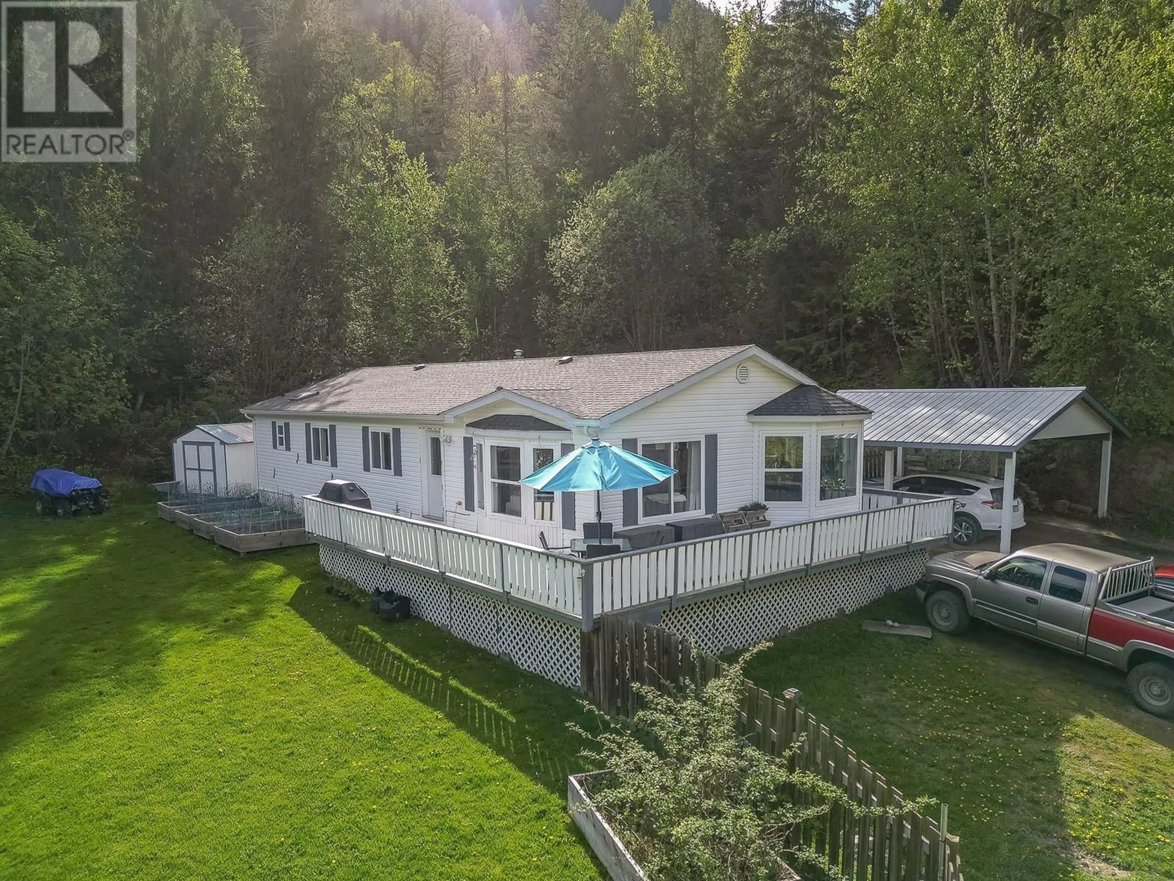 A pic from outside/outdoor area/front of a property/back of a property/a pic from drone, water/lake/river/ocean view for 725 ABBINGTON LANE, Tappen British Columbia V0E2X0