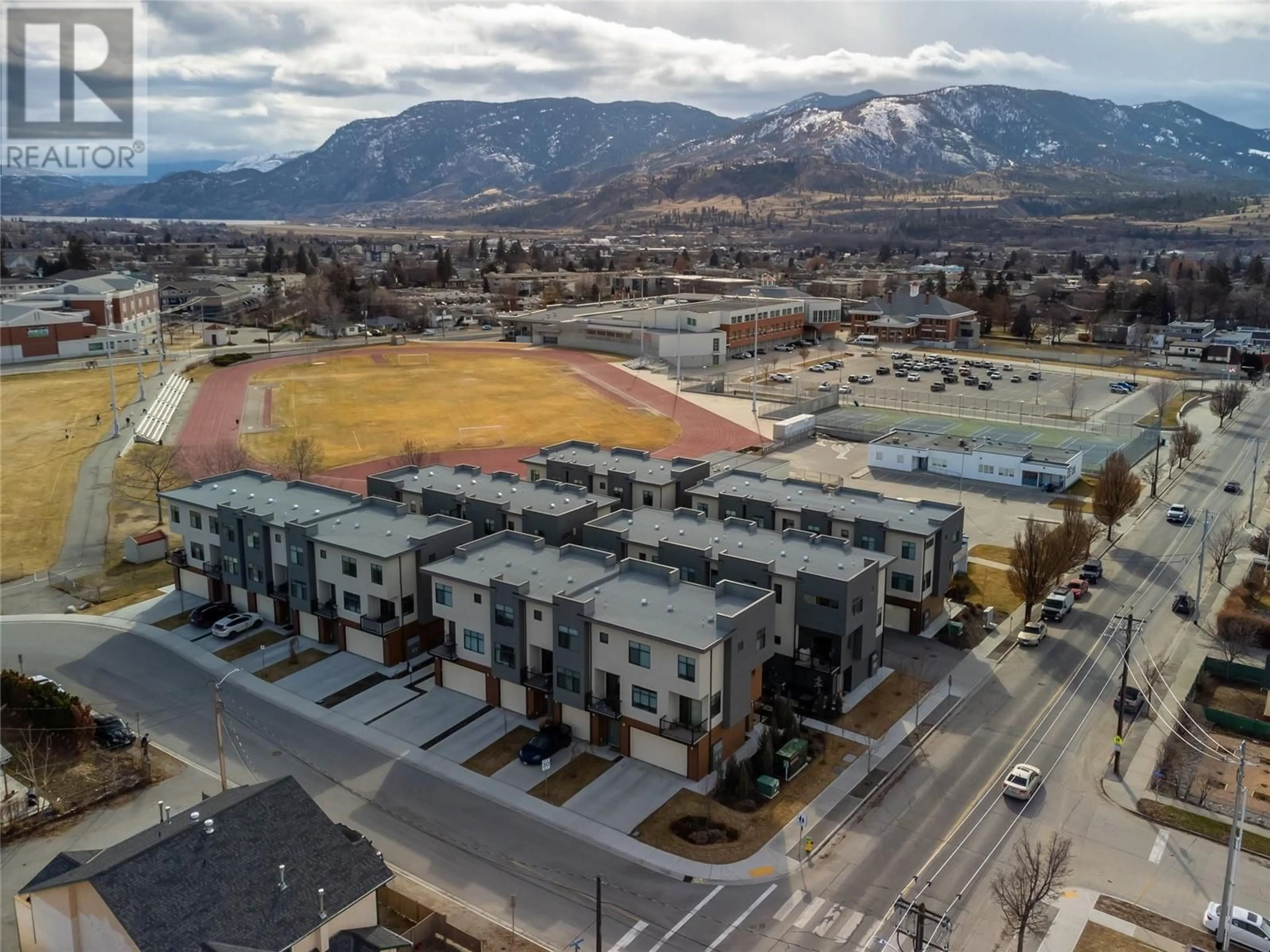 A pic from outside/outdoor area/front of a property/back of a property/a pic from drone, mountain view for 388 Eckhardt Avenue E Unit# 106, Penticton British Columbia V2A0C7