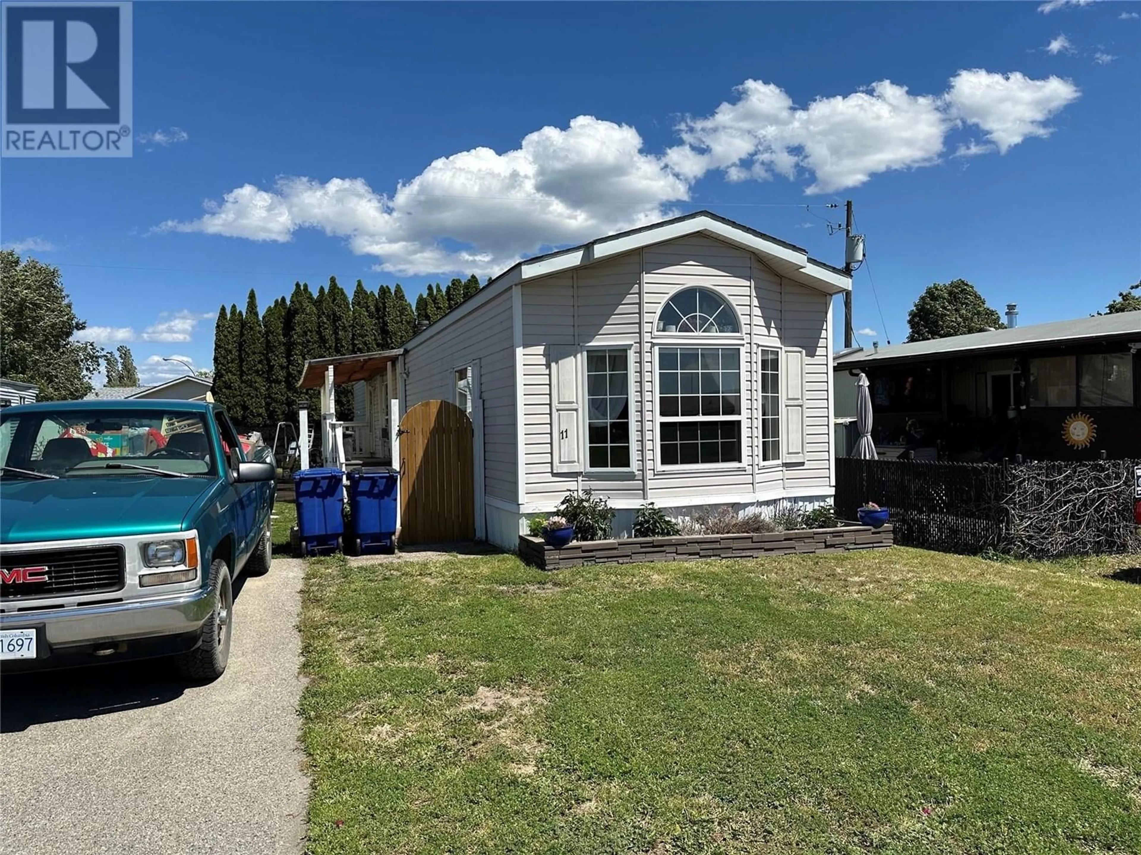 Home with vinyl exterior material, street for 11 - 2035 BOUCHERIE ROAD, West Kelowna British Columbia V4T1Z6