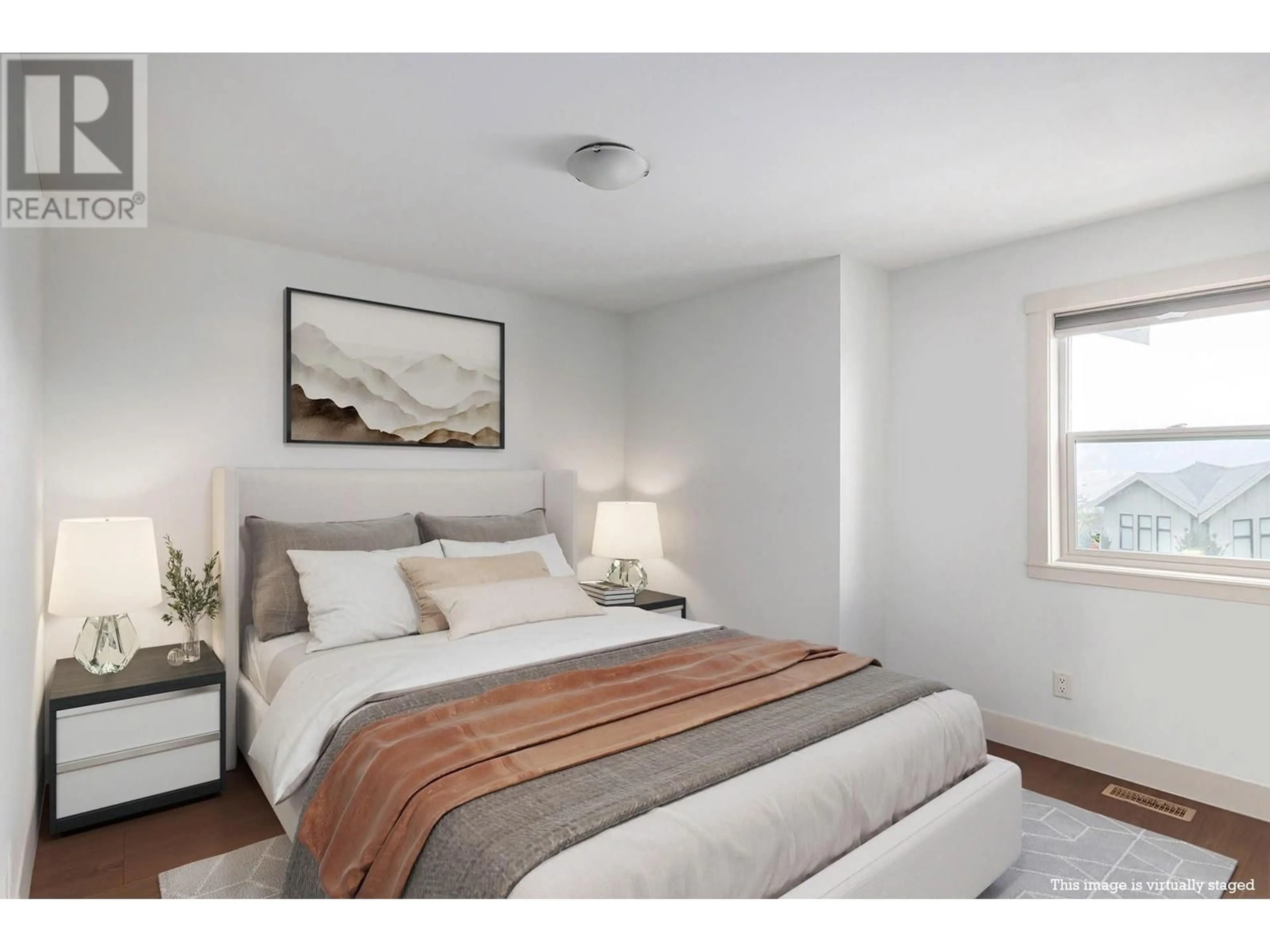 Bedroom with bed, wood/laminate floor for 13452 SHORELINE DRIVE, Lake Country British Columbia V4V2W3