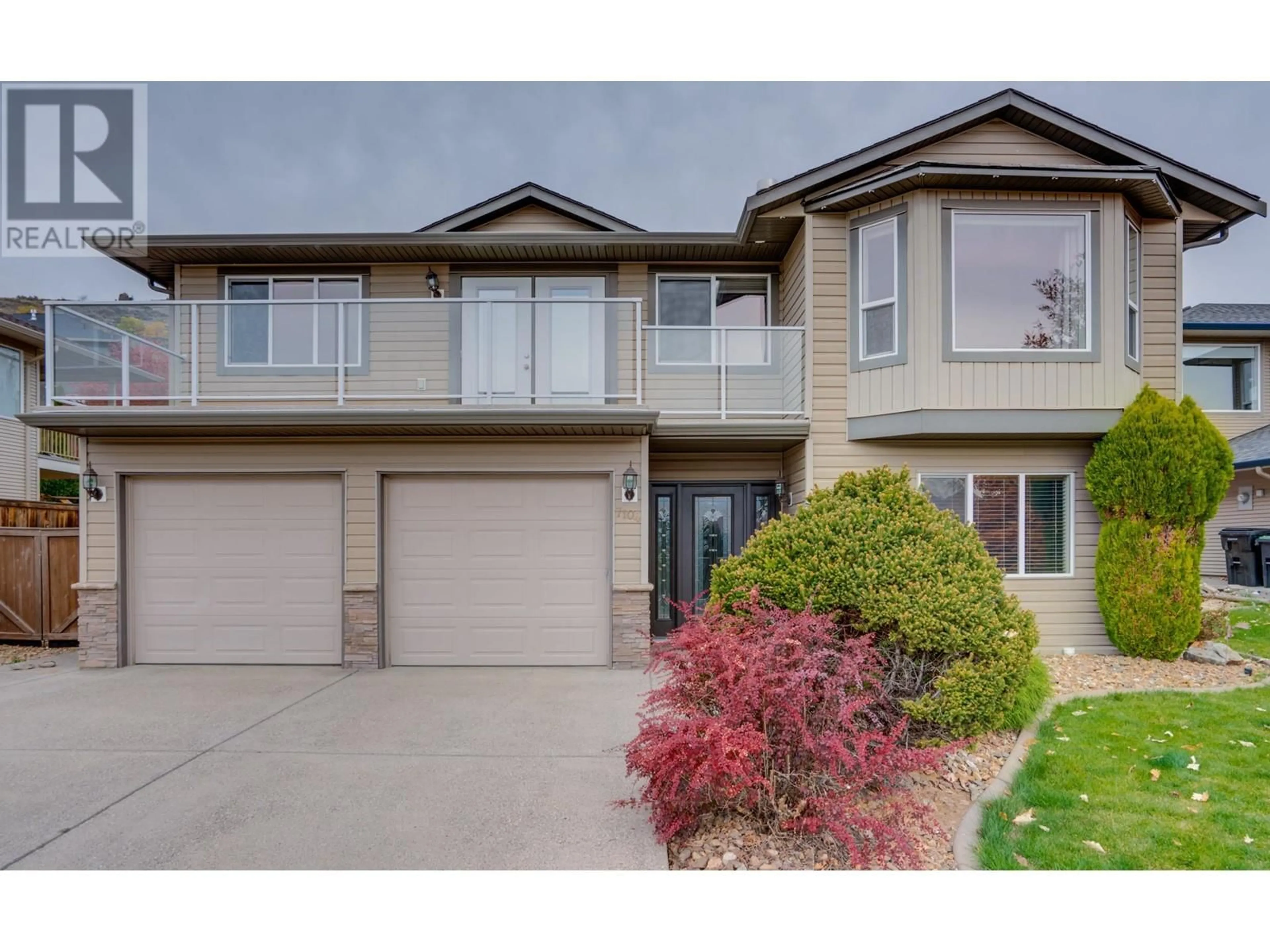 Home with vinyl exterior material, street for 7104 LAKERIDGE DRIVE, Vernon British Columbia V1H1P3