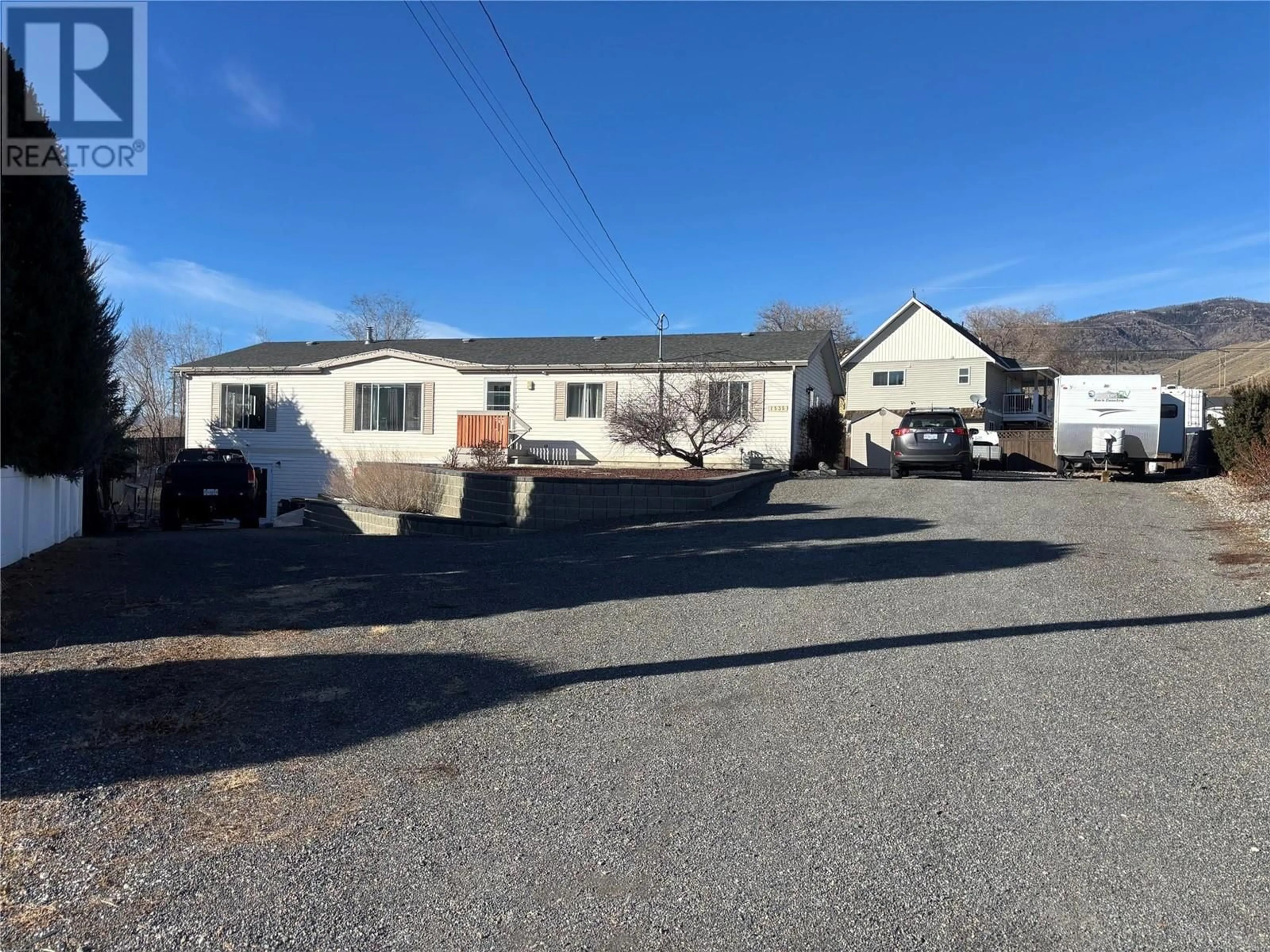 A pic from outside/outdoor area/front of a property/back of a property/a pic from drone, building for 1535 CUMMING BOULEVARD, Cache Creek British Columbia V0K1H0