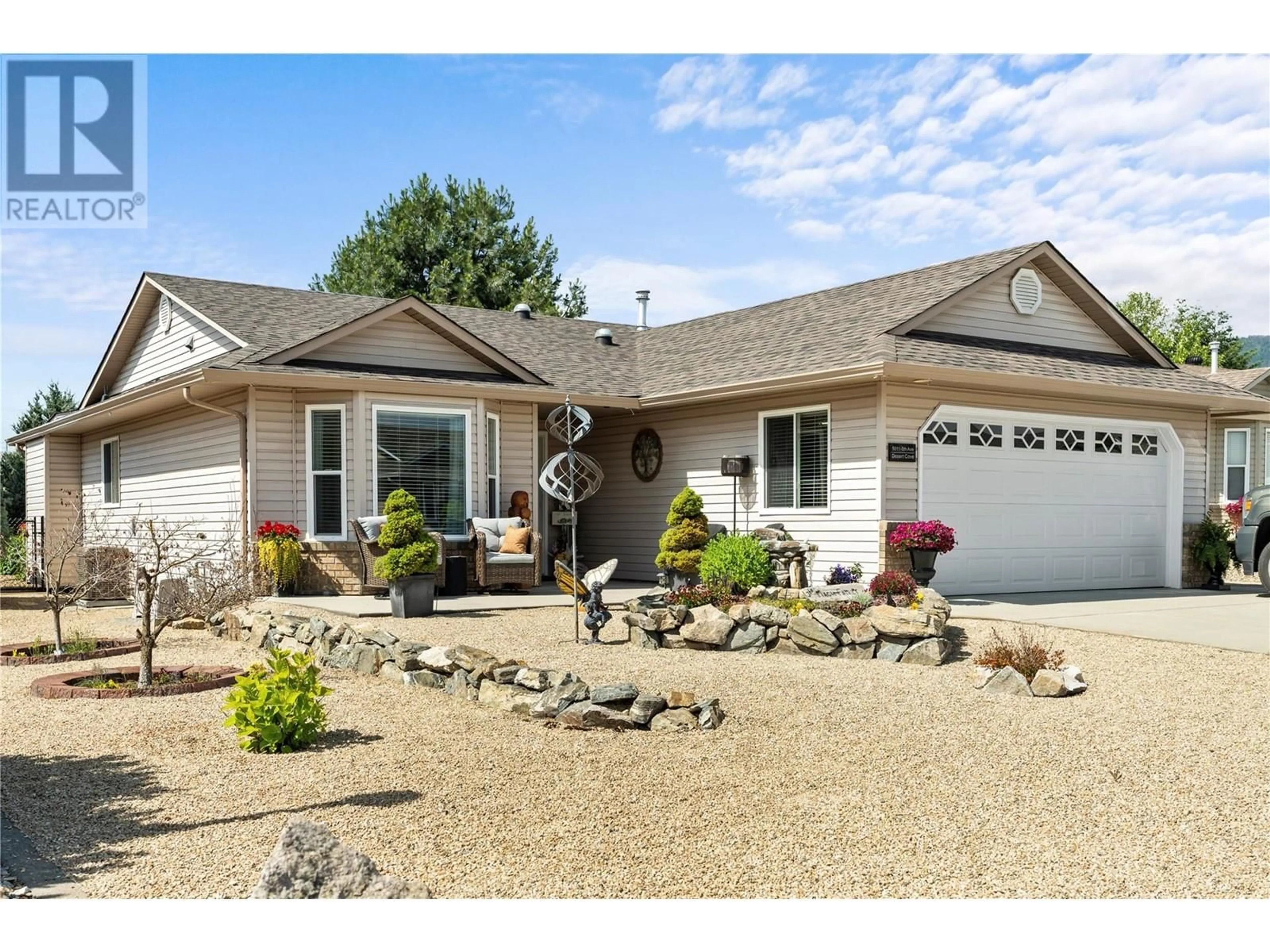Home with vinyl exterior material, street for 5011 5 Avenue, Vernon British Columbia V1H1Z1