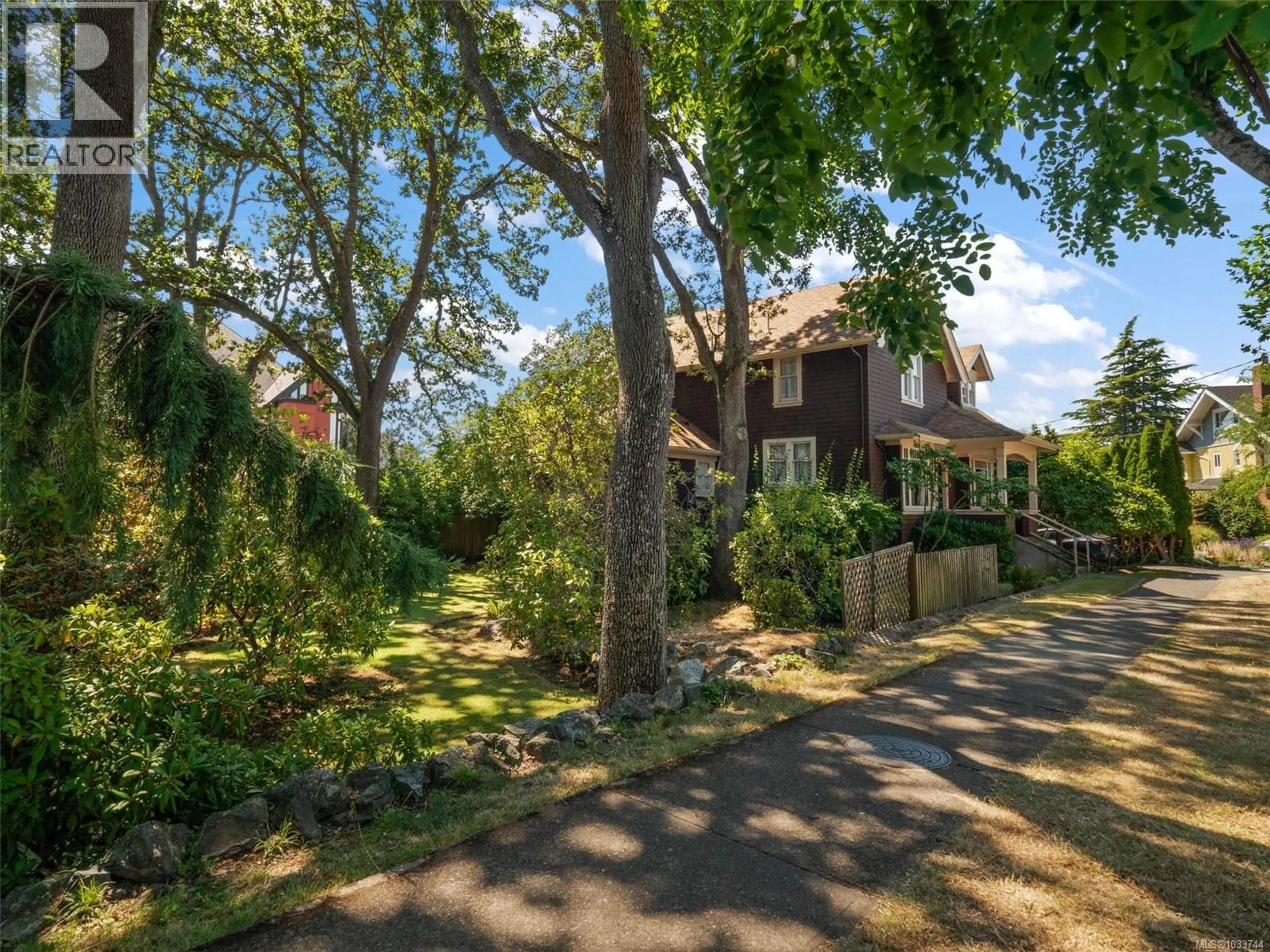 A pic from outside/outdoor area/front of a property/back of a property/a pic from drone, street for 1353 CRAIGDARROCH ROAD, Victoria British Columbia V8S2A6