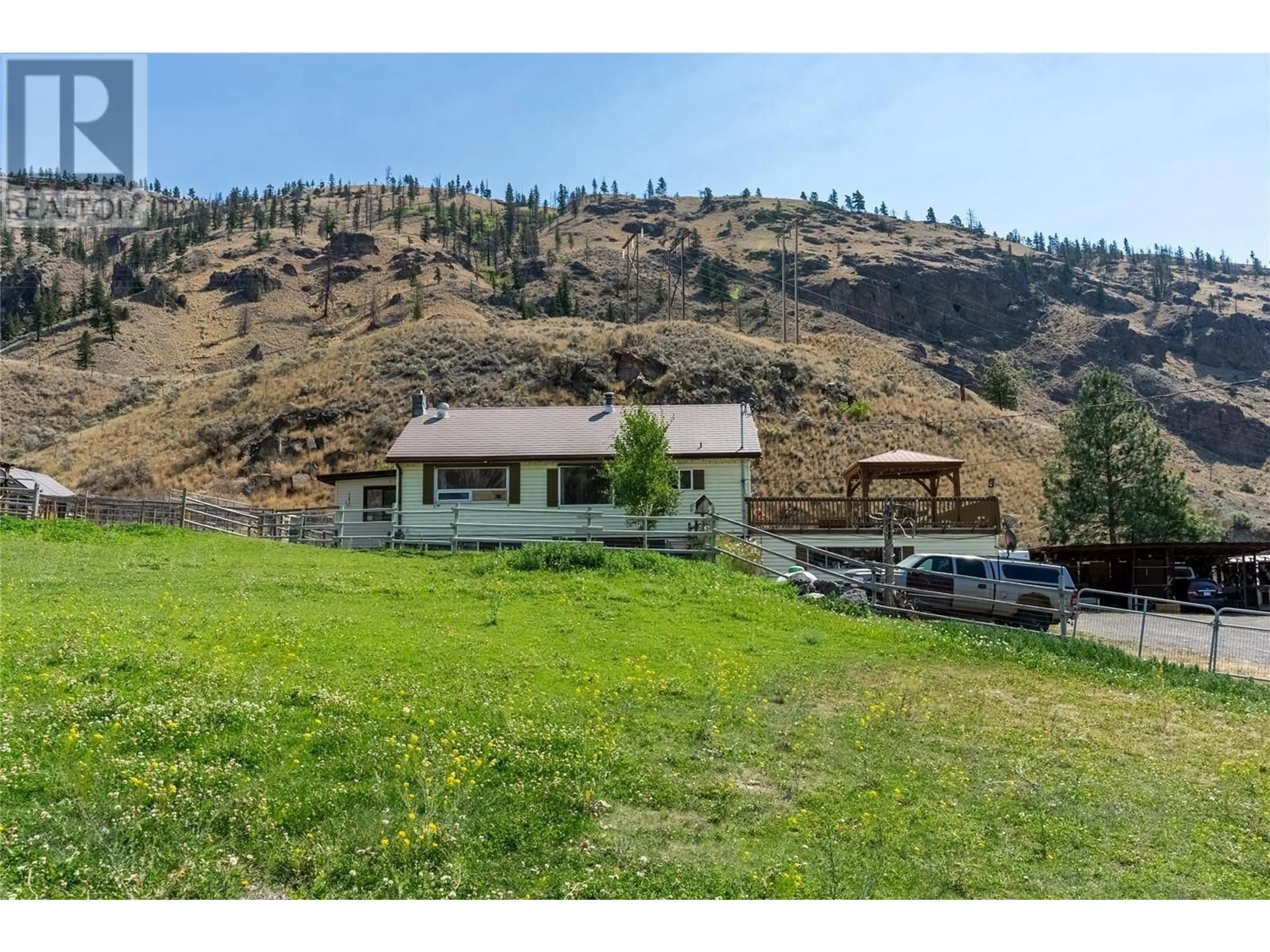 A pic from outside/outdoor area/front of a property/back of a property/a pic from drone, mountain view for 4088 HILLS FRONTAGE ROAD, Cache Creek British Columbia V0K1H0