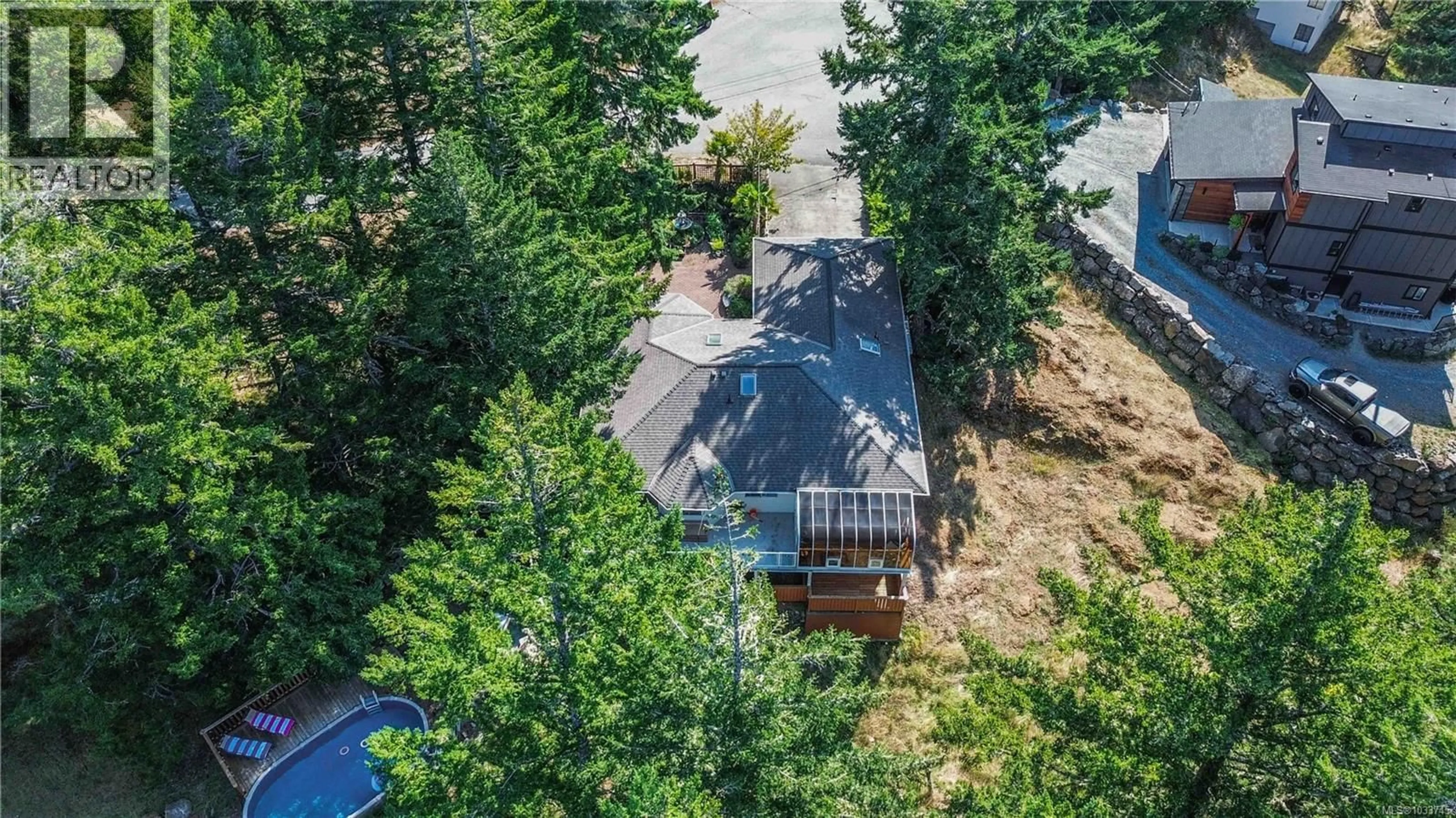 A pic from outside/outdoor area/front of a property/back of a property/a pic from drone, forest/trees view for 646 CAINS WAY, Sooke British Columbia V9Z1C6