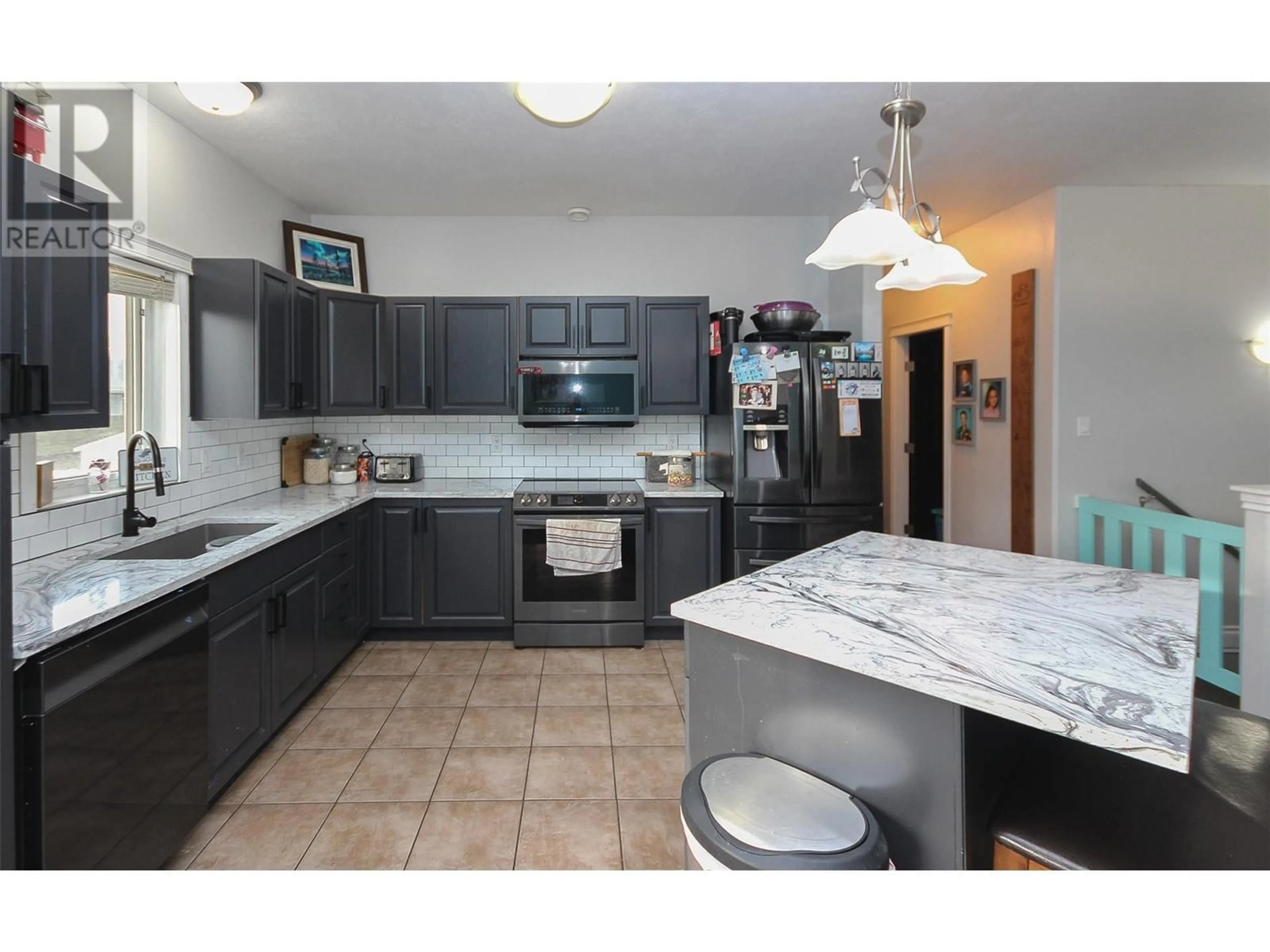 Standard kitchen, ceramic/tile floor for 8709 19A Street, Dawson Creek British Columbia V1G0A7