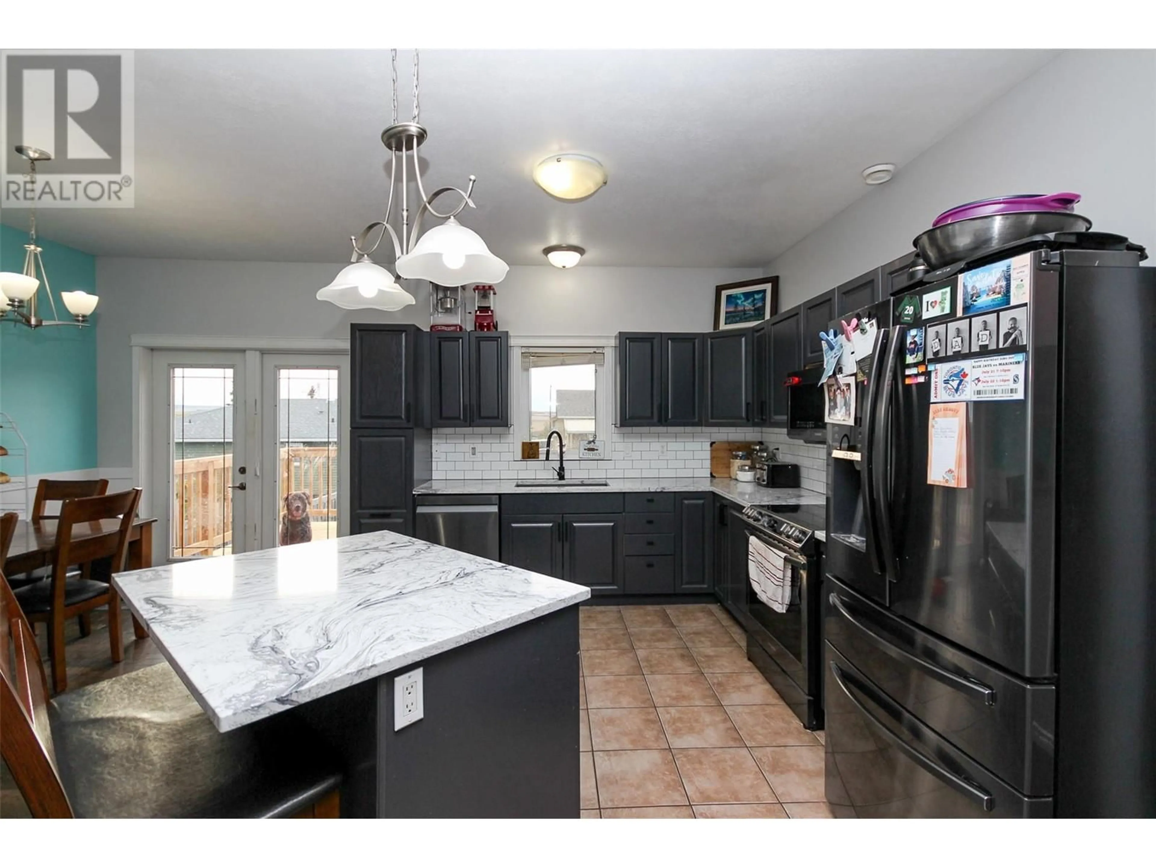 Open concept kitchen, ceramic/tile floor for 8709 19A Street, Dawson Creek British Columbia V1G0A7