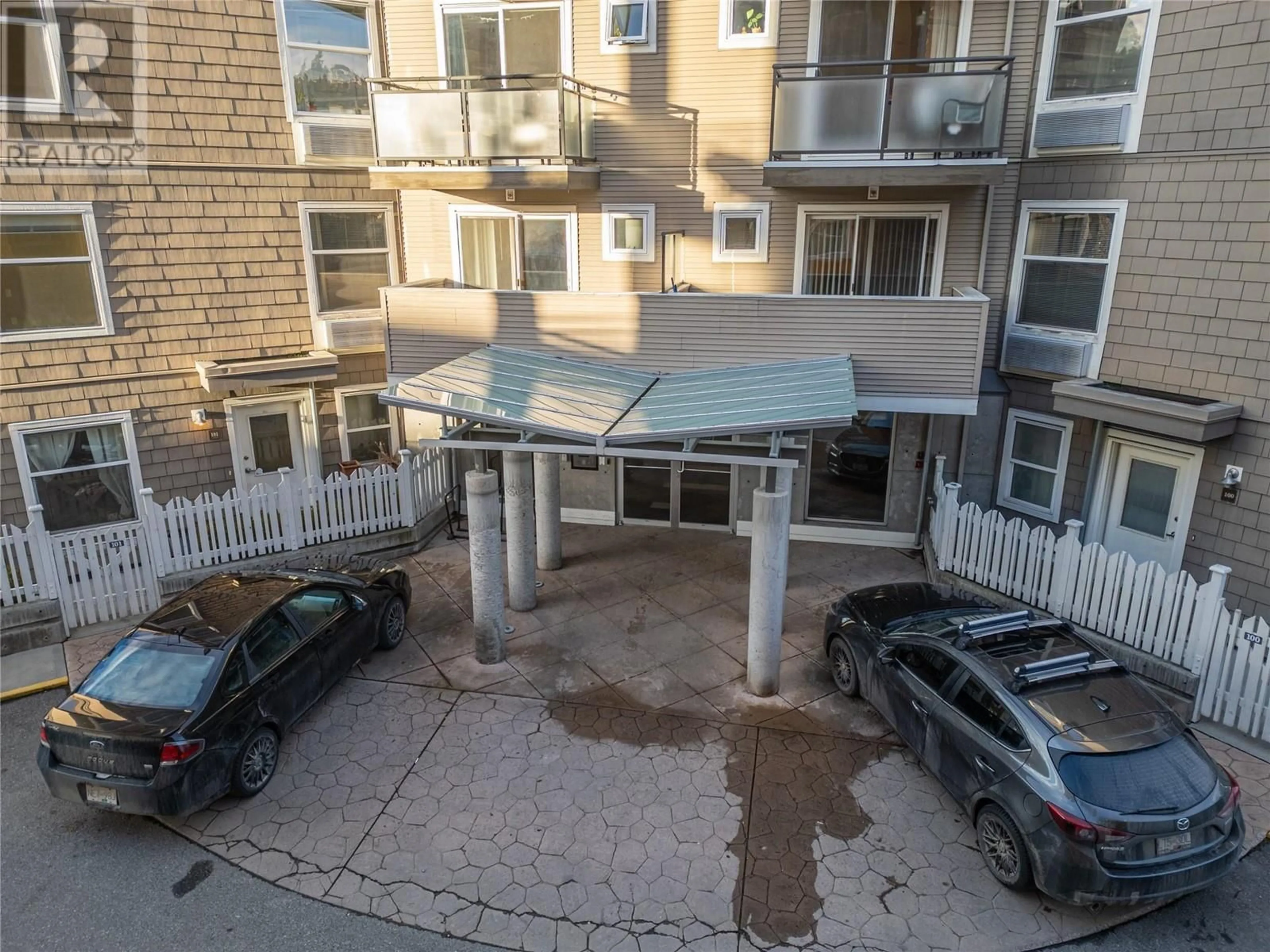 Balcony in the apartment, city buildings view from balcony for 204 - 533 YATES ROAD, Kelowna British Columbia V1V2T7