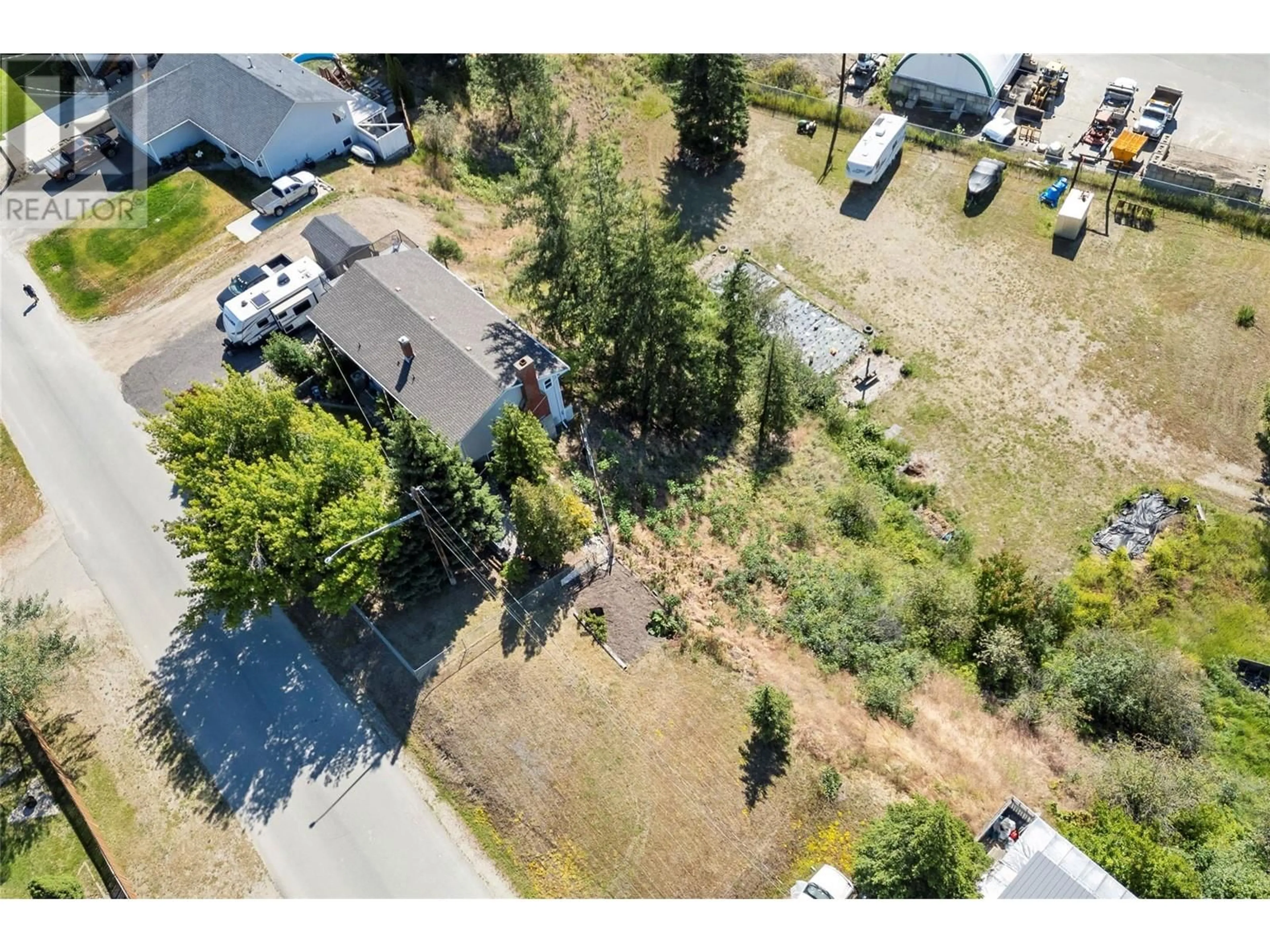 A pic from outside/outdoor area/front of a property/back of a property/a pic from drone, unknown for 1117 Thompson Avenue, Chase British Columbia V0E1M0