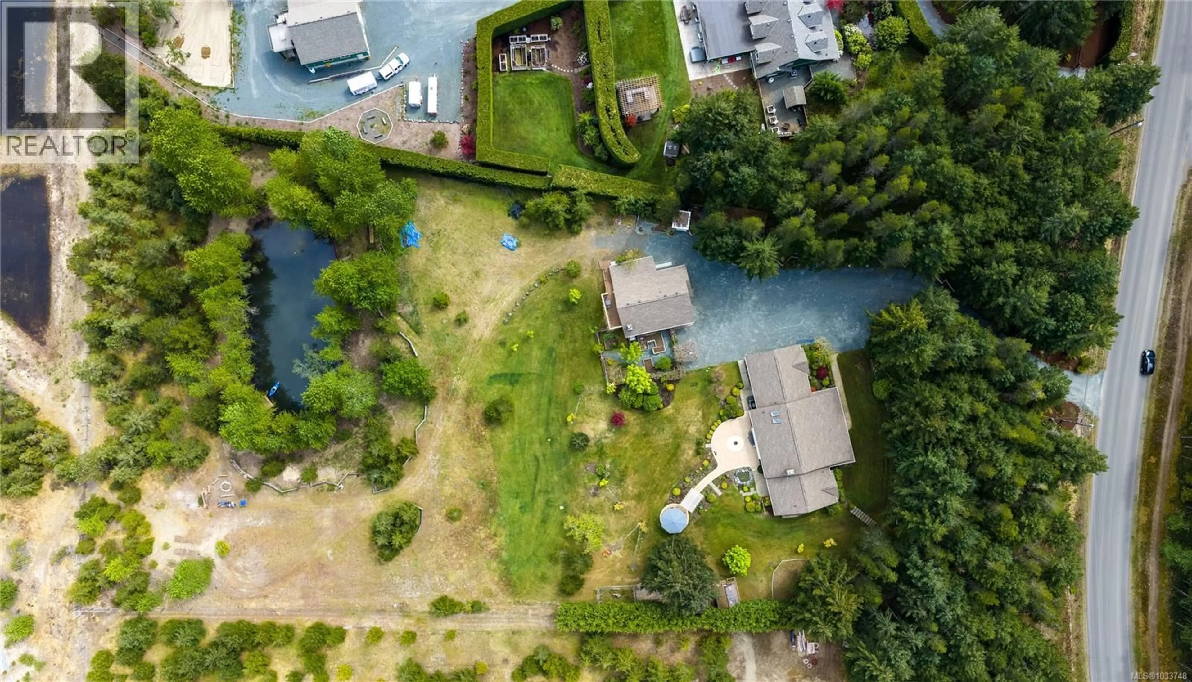 A pic from outside/outdoor area/front of a property/back of a property/a pic from drone, water/lake/river/ocean view for 905 RIVERS EDGE DRIVE, Nanoose Bay British Columbia V9P9L6