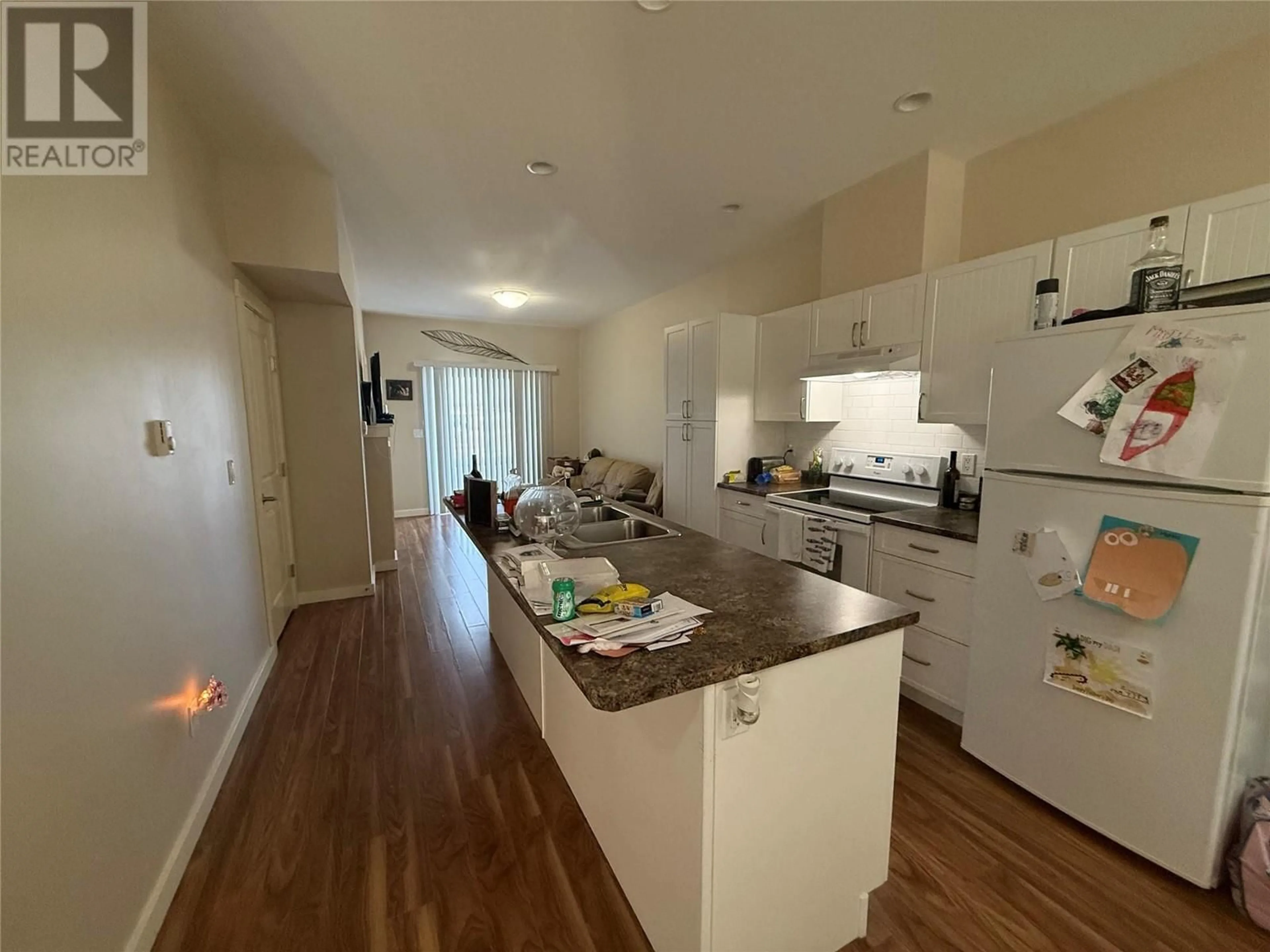 Open concept kitchen, unknown for 104 - 1617 88 AVENUE, Dawson Creek British Columbia V1G0E8