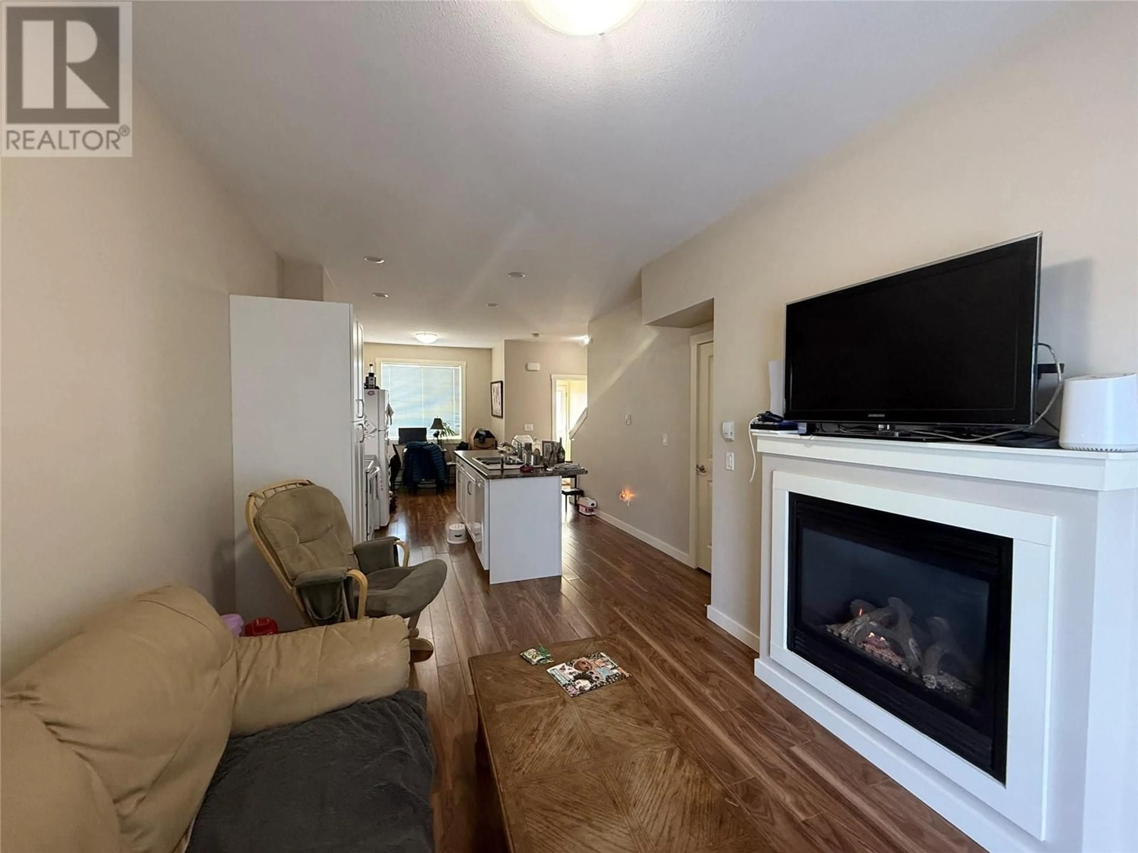 Living room with furniture, unknown for 104 - 1617 88 AVENUE, Dawson Creek British Columbia V1G0E8
