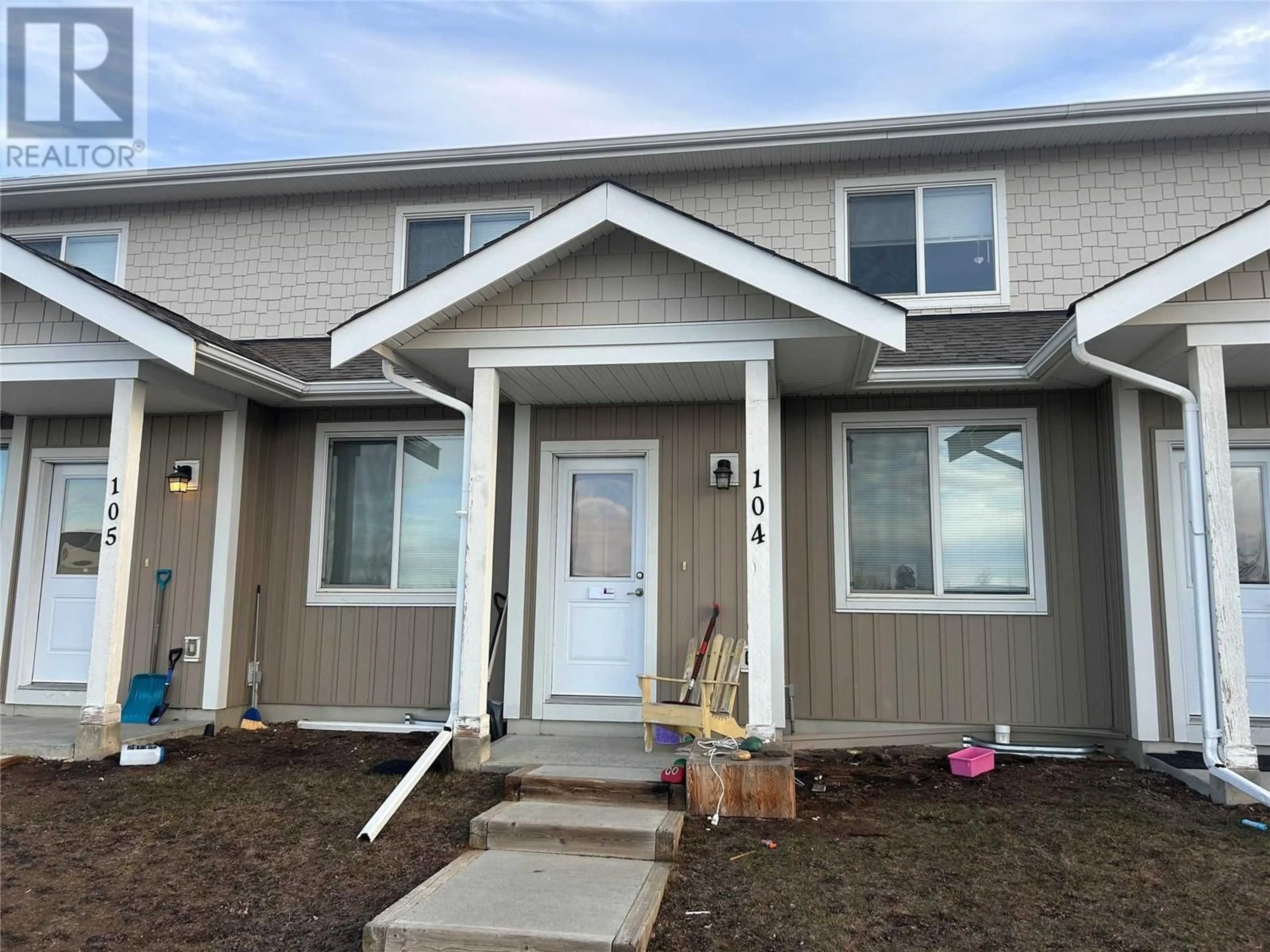 Home with vinyl exterior material, street for 1617 88 Avenue Unit# 104, Dawson Creek British Columbia V1G0E8