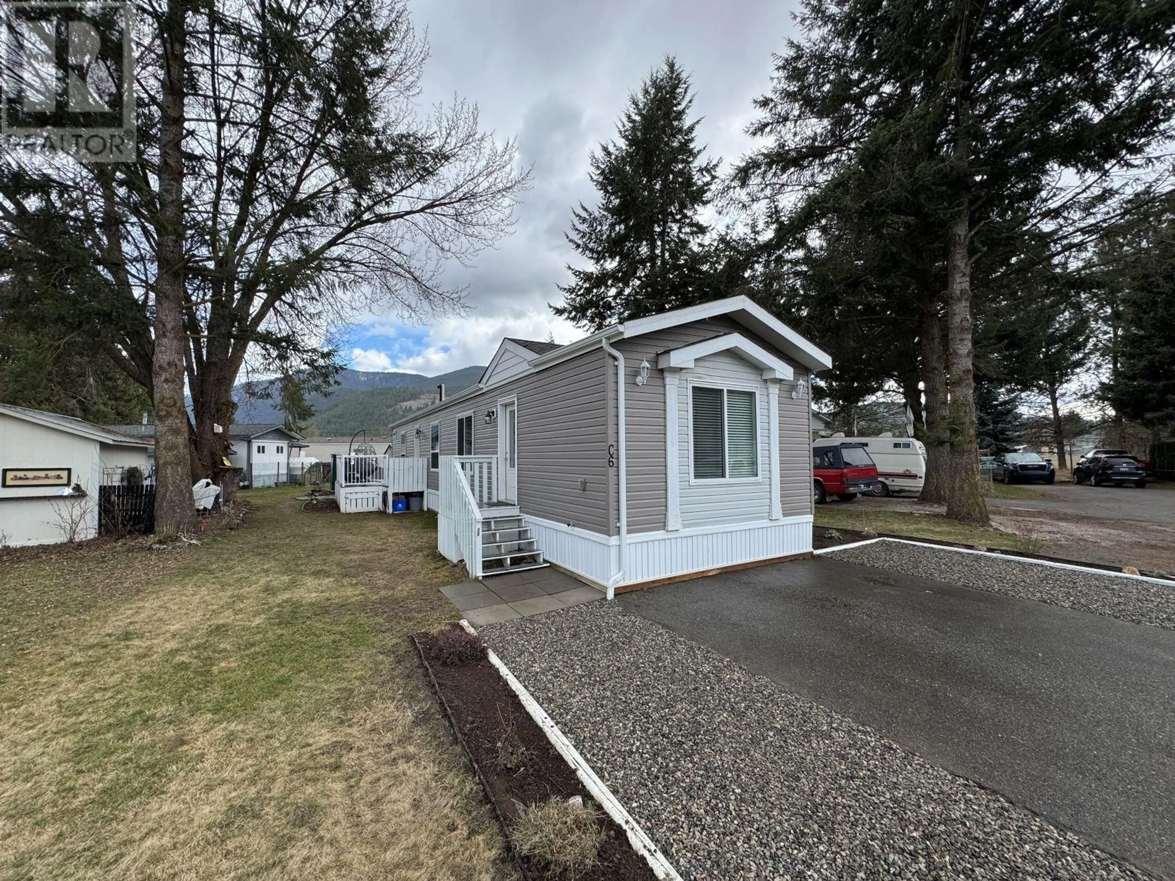 Home with vinyl exterior material, street for C6 - 5455 ALMOND GARDENS ROAD, Grand Forks British Columbia V0H1H4