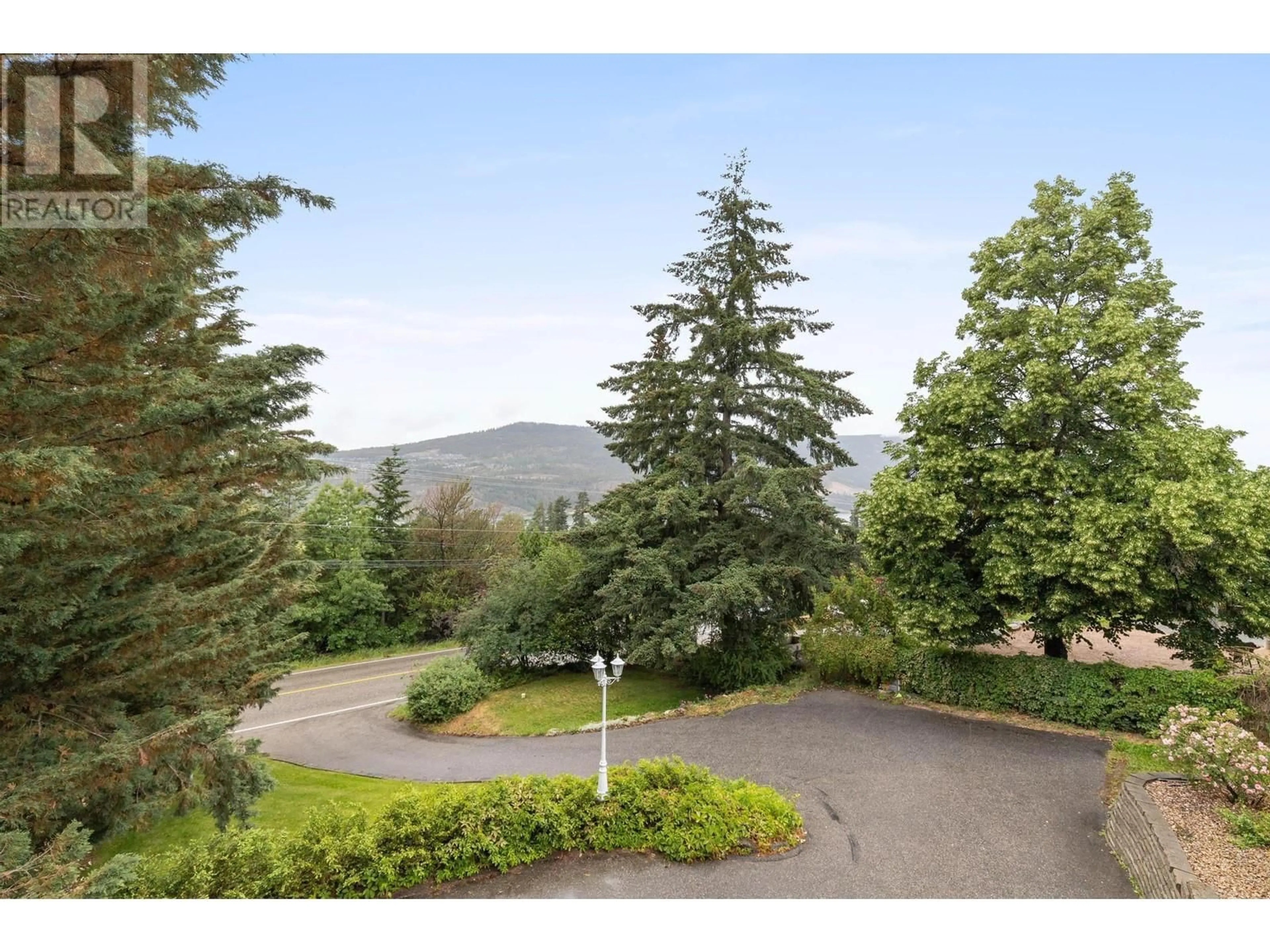 A pic from outside/outdoor area/front of a property/back of a property/a pic from drone, mountain view for 12857 OYAMA ROAD, Lake Country British Columbia V4V2A7
