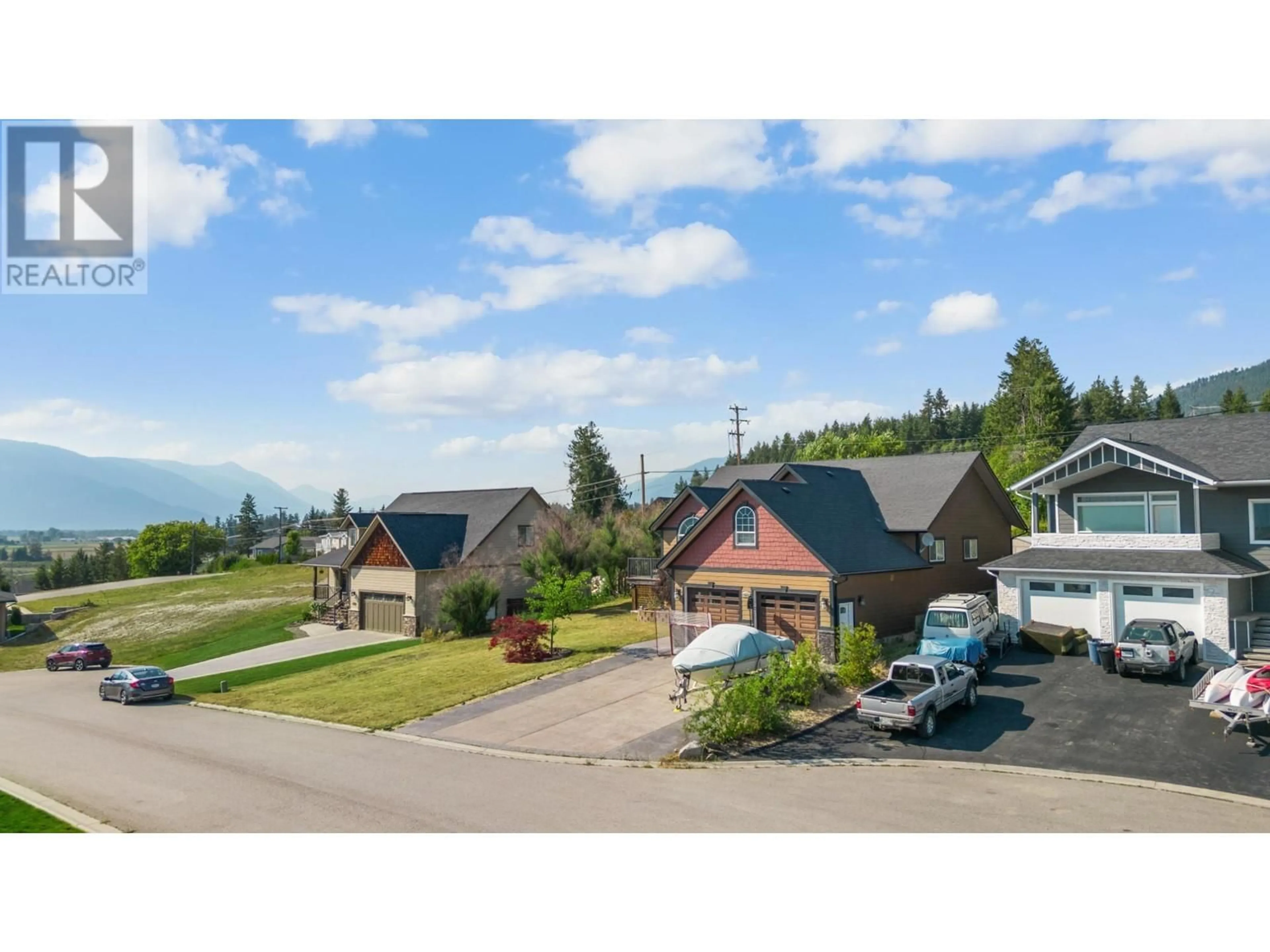 A pic from outside/outdoor area/front of a property/back of a property/a pic from drone, mountain view for 1028 PURCELL CRESCENT, Creston British Columbia V0B1G3