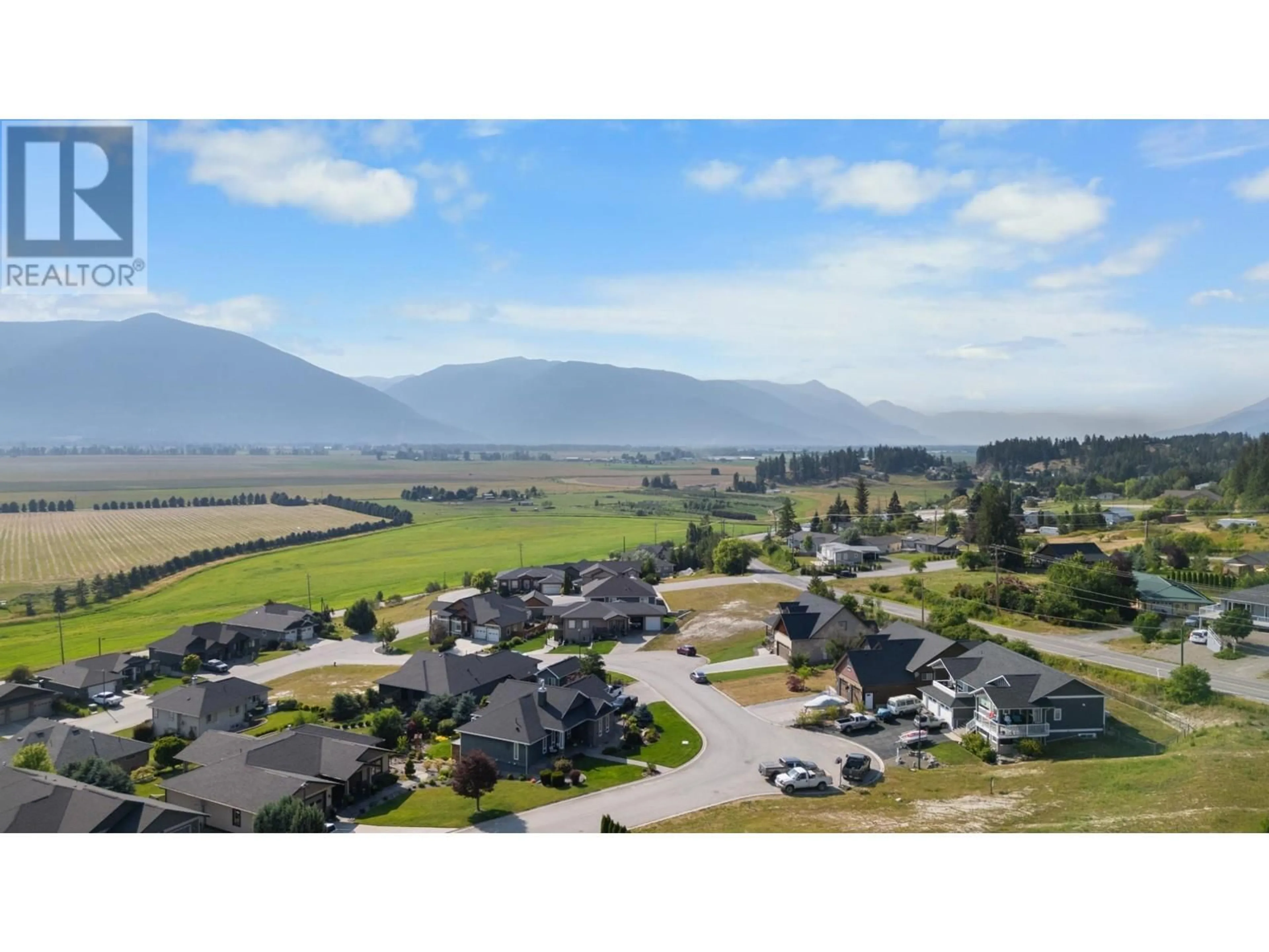 A pic from outside/outdoor area/front of a property/back of a property/a pic from drone, mountain view for 1028 PURCELL CRESCENT, Creston British Columbia V0B1G3
