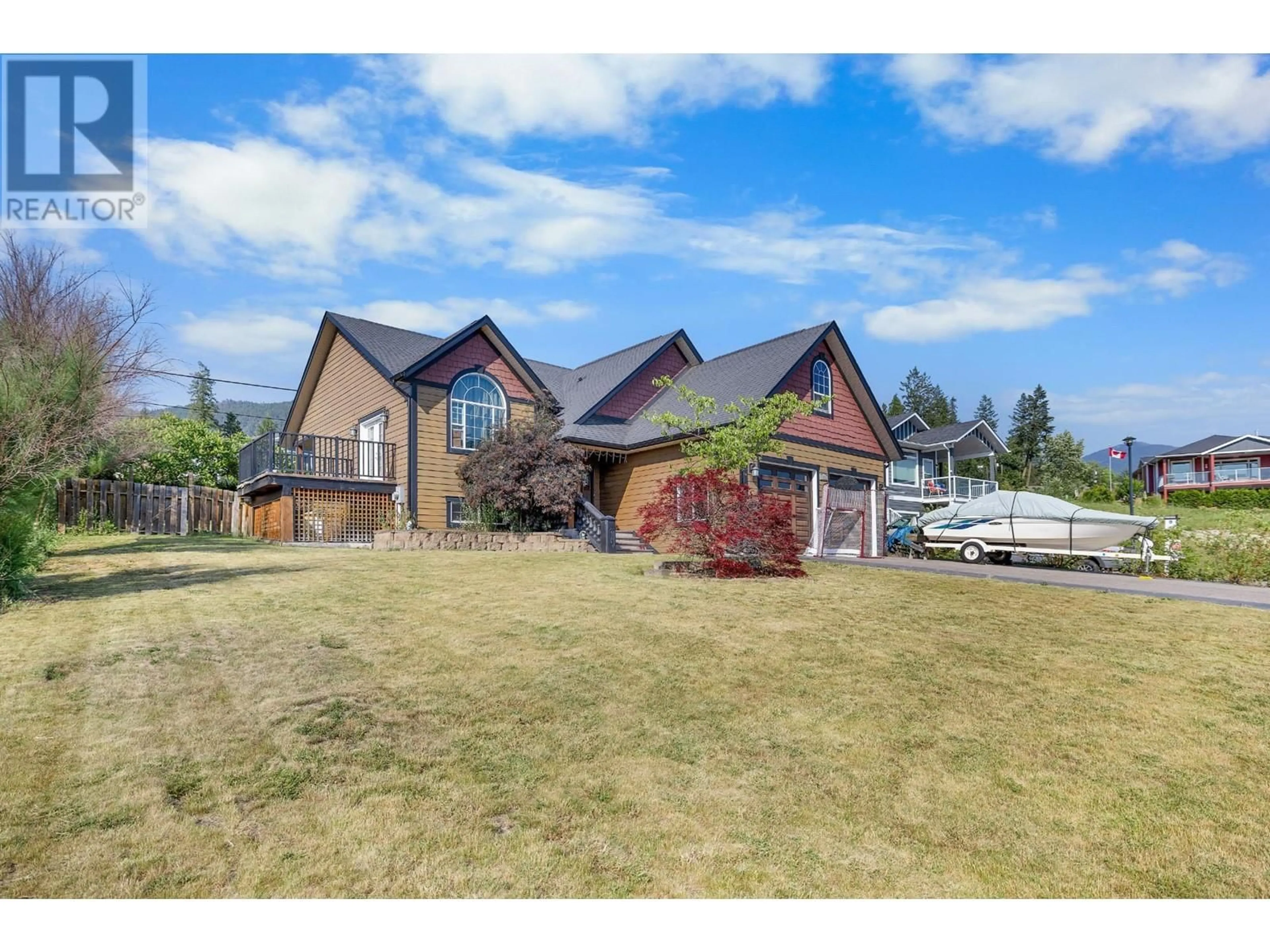 A pic from outside/outdoor area/front of a property/back of a property/a pic from drone, mountain view for 1028 PURCELL CRESCENT, Creston British Columbia V0B1G3